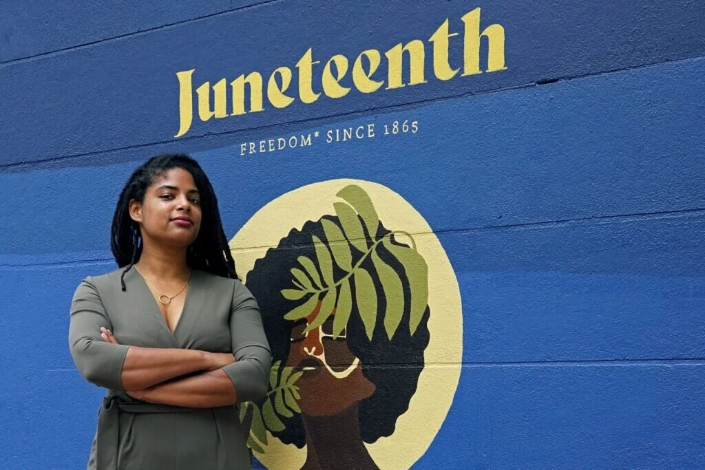 me in front of mural.jpeg