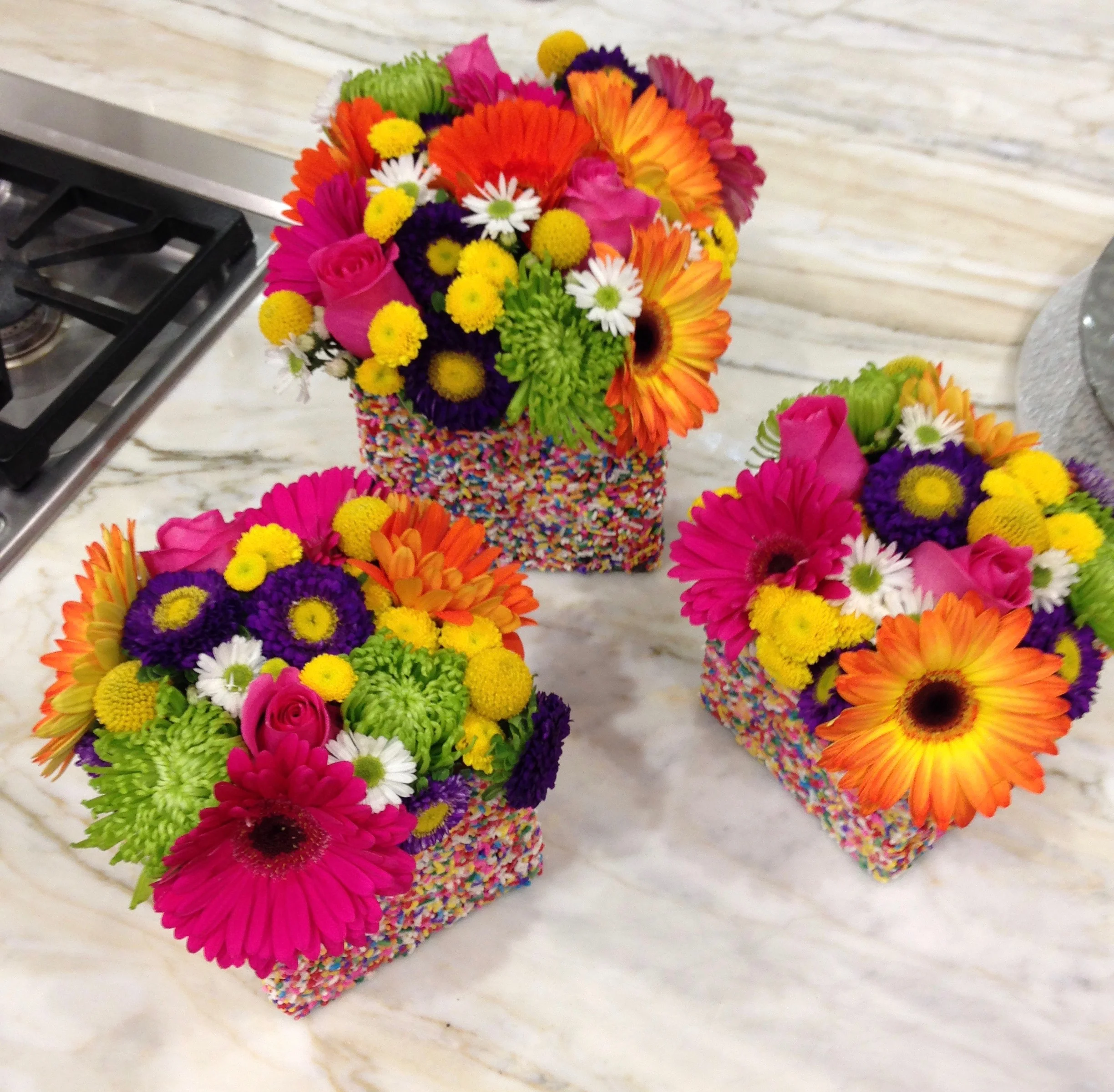 Centerpieces/flower arrangements for baby sprinkle (not yet placed on table)