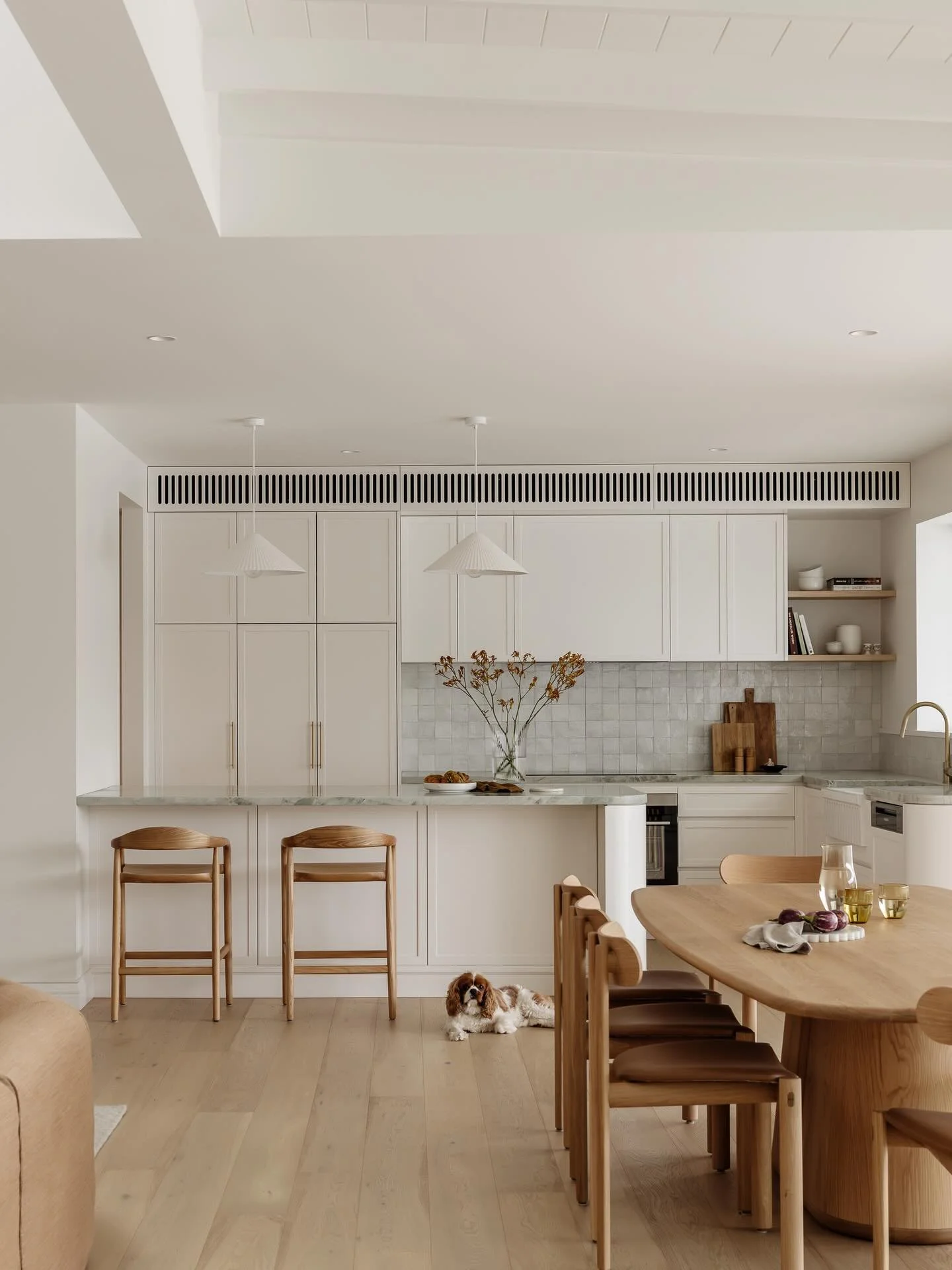 The Oatley kitchen was more on the classic side with the sweet bolection detail on the curved island end paired with the shaker doors. Originally we never planned on green stone but the client had a change of heart mid project and that&rsquo;s where 