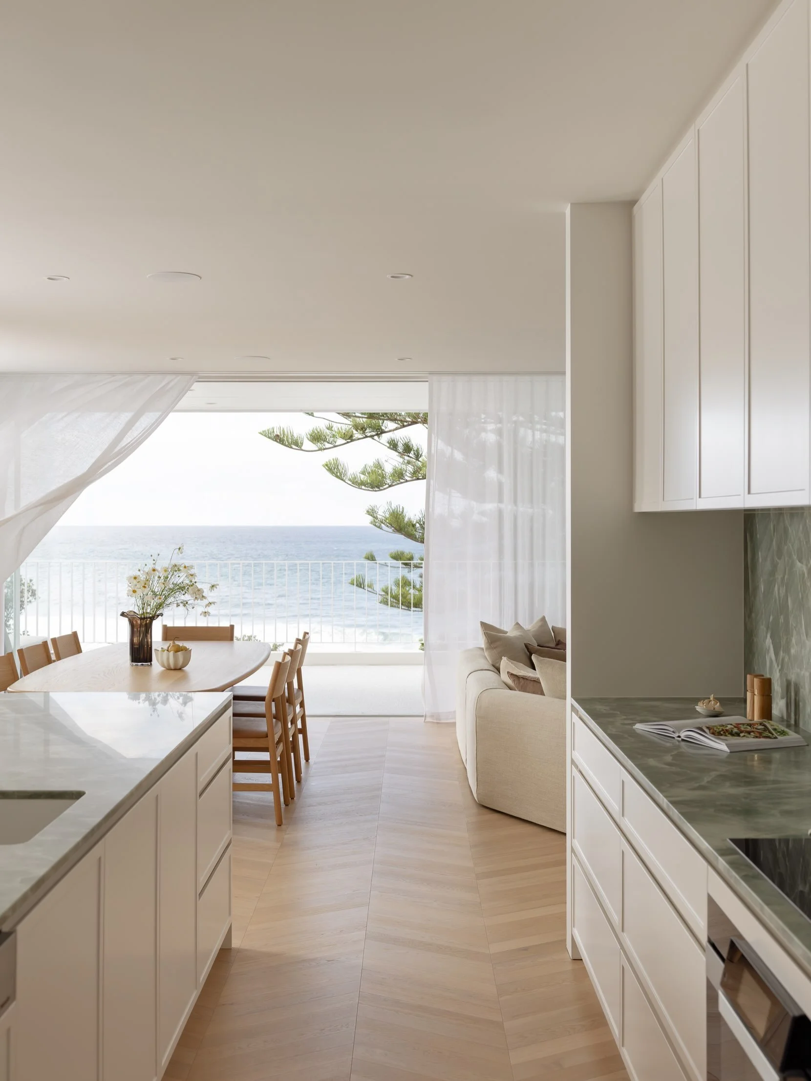 The kitchen at our Wombarra project is defined by the gorgeous emerald green natural stone bench tops and splashback&hellip;it has created quite the contrast to the white joinery. It&rsquo;s also a nice tie in with the green pine trees visible out th
