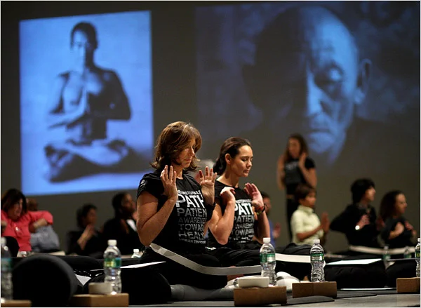 Donna Karan, left, and Sonja Nuttall, co-founders of the Urban Zen Foundation, introducing their yoga program to officials of Beth Israel Medical Center. Credit: Chang W. Lee/The New York Times