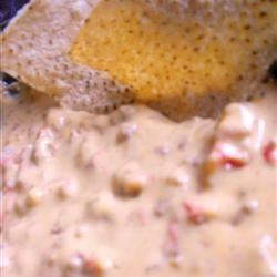 "Spicy and cheesy -- this dip will turn anyone's frown upside down! It's great for company and during the holidays. Serve with tortilla chips."