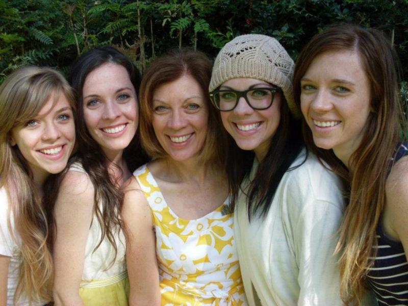Tami Auda flanked by her four daughters