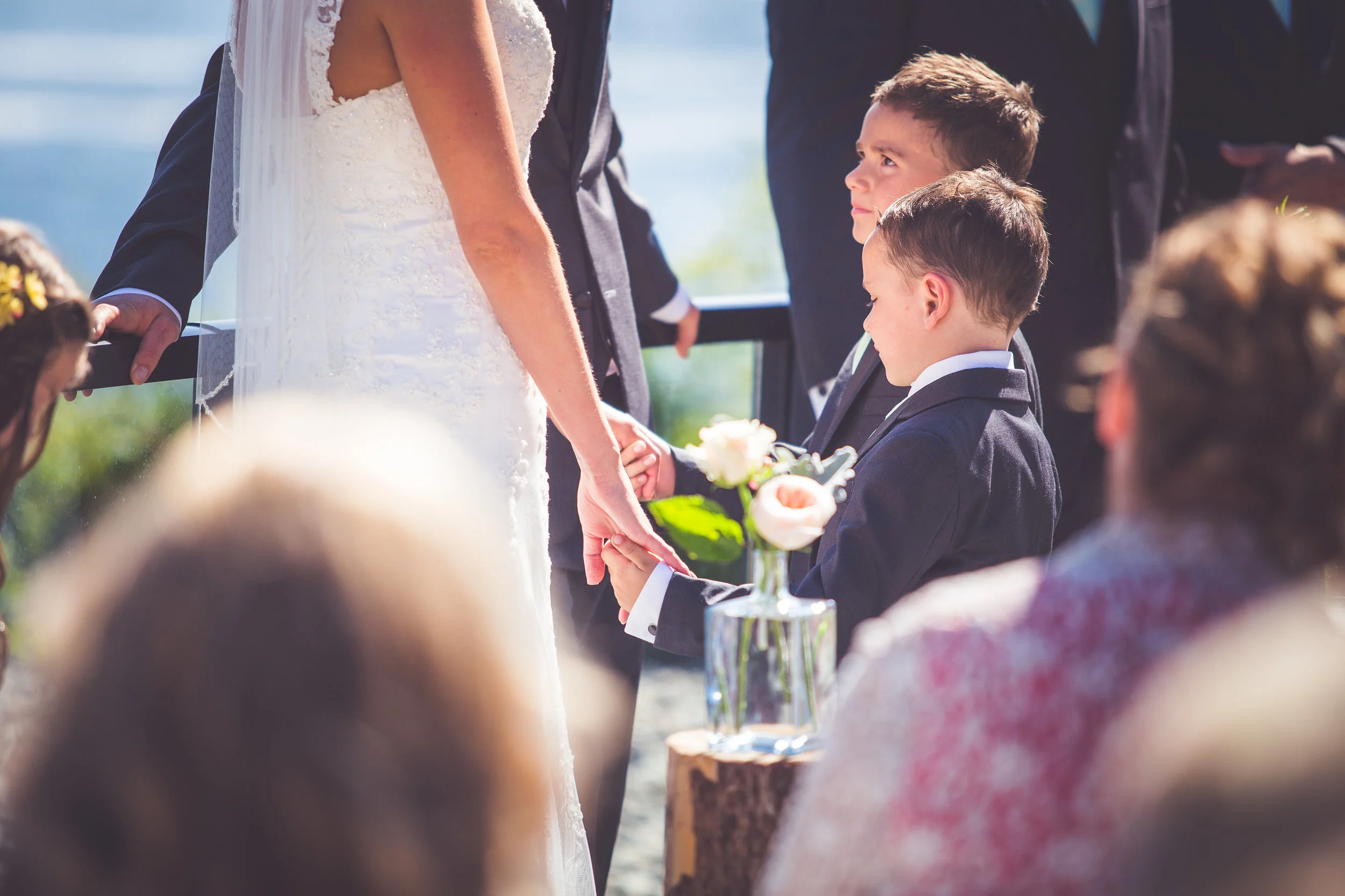 kids join bride and groom vows during black rock oceanfront resort wedding ceremony