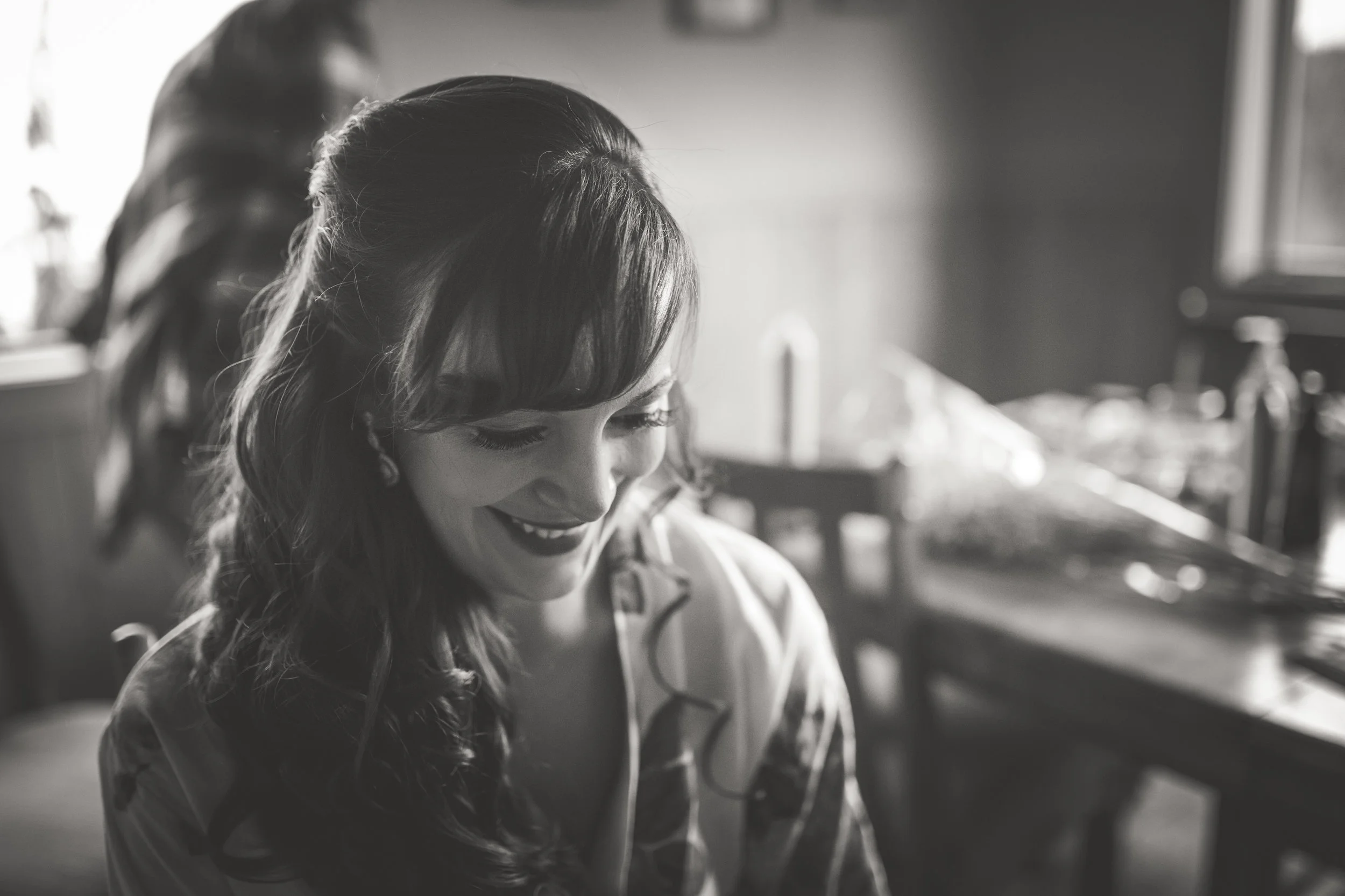 smiling bride gets ready for her vancouver island mountain wedding