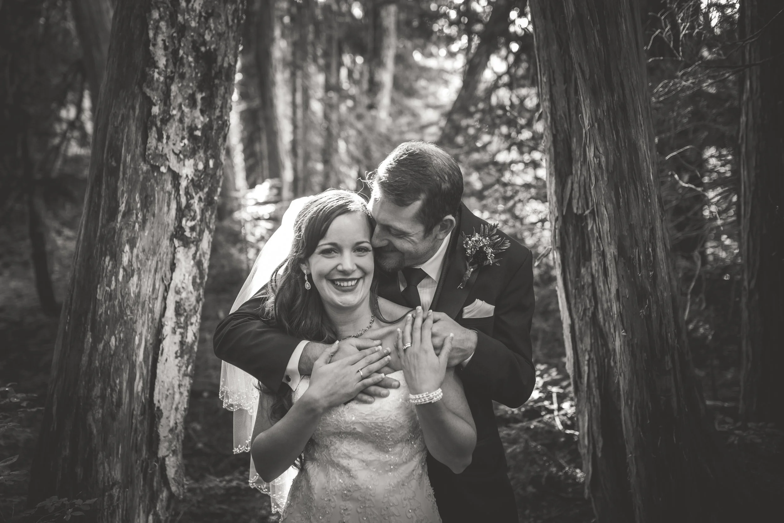 happy bride and groom in black and white photo