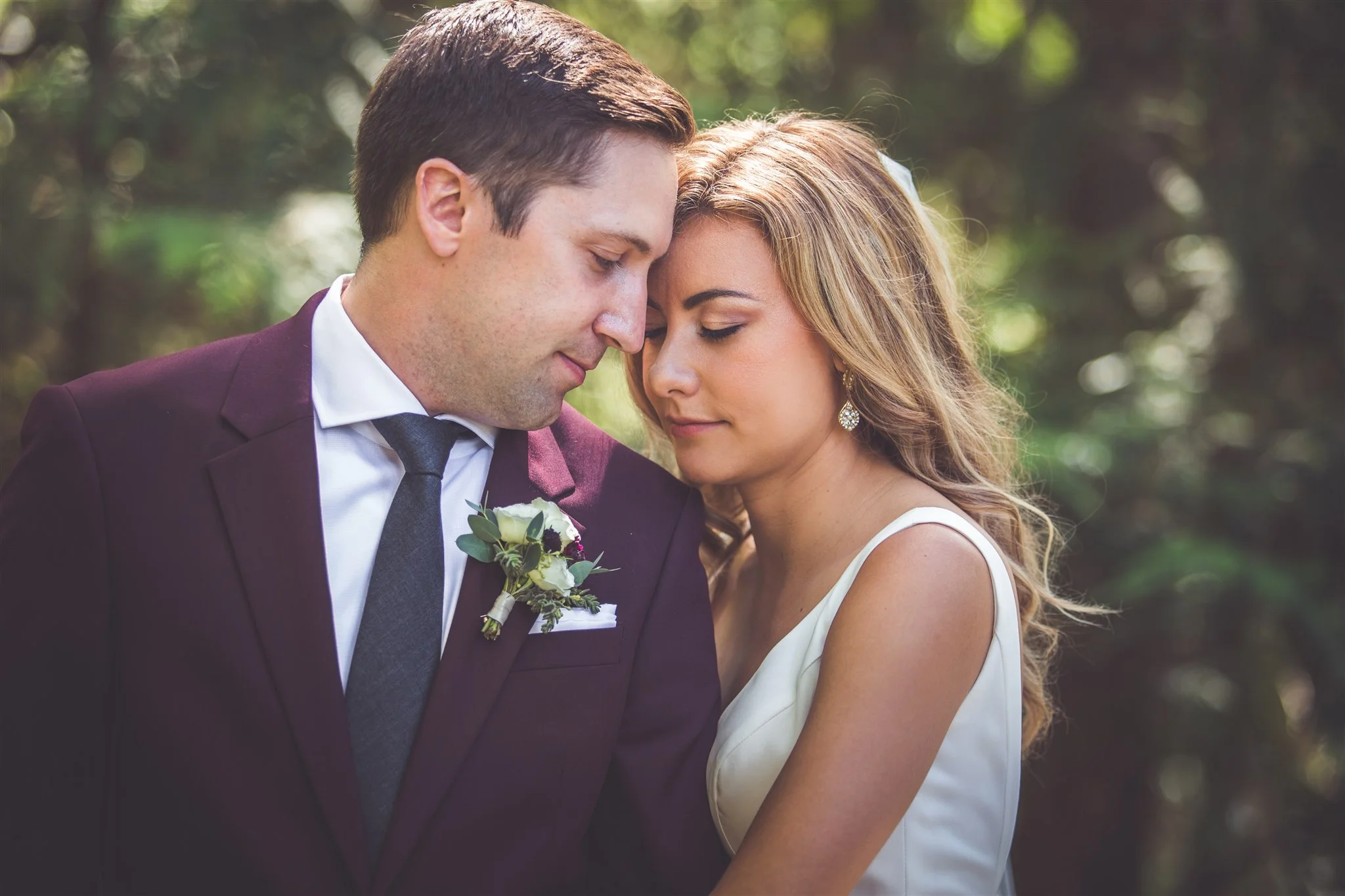 groom in burgendy suit for Qualicum Beach wedding