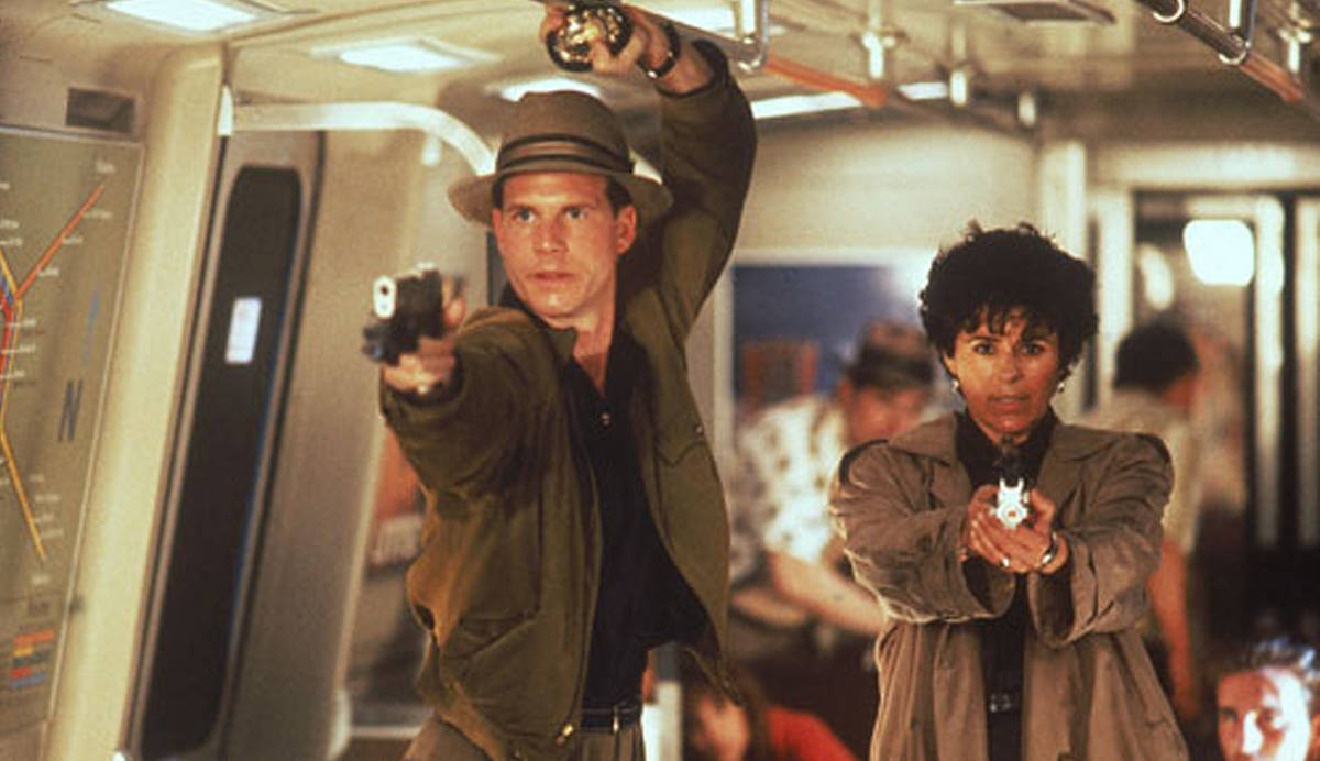 Bill Paxton as Jerry Lambert and Maria Conchita Alonso as Leona Cantrell in Predator 2