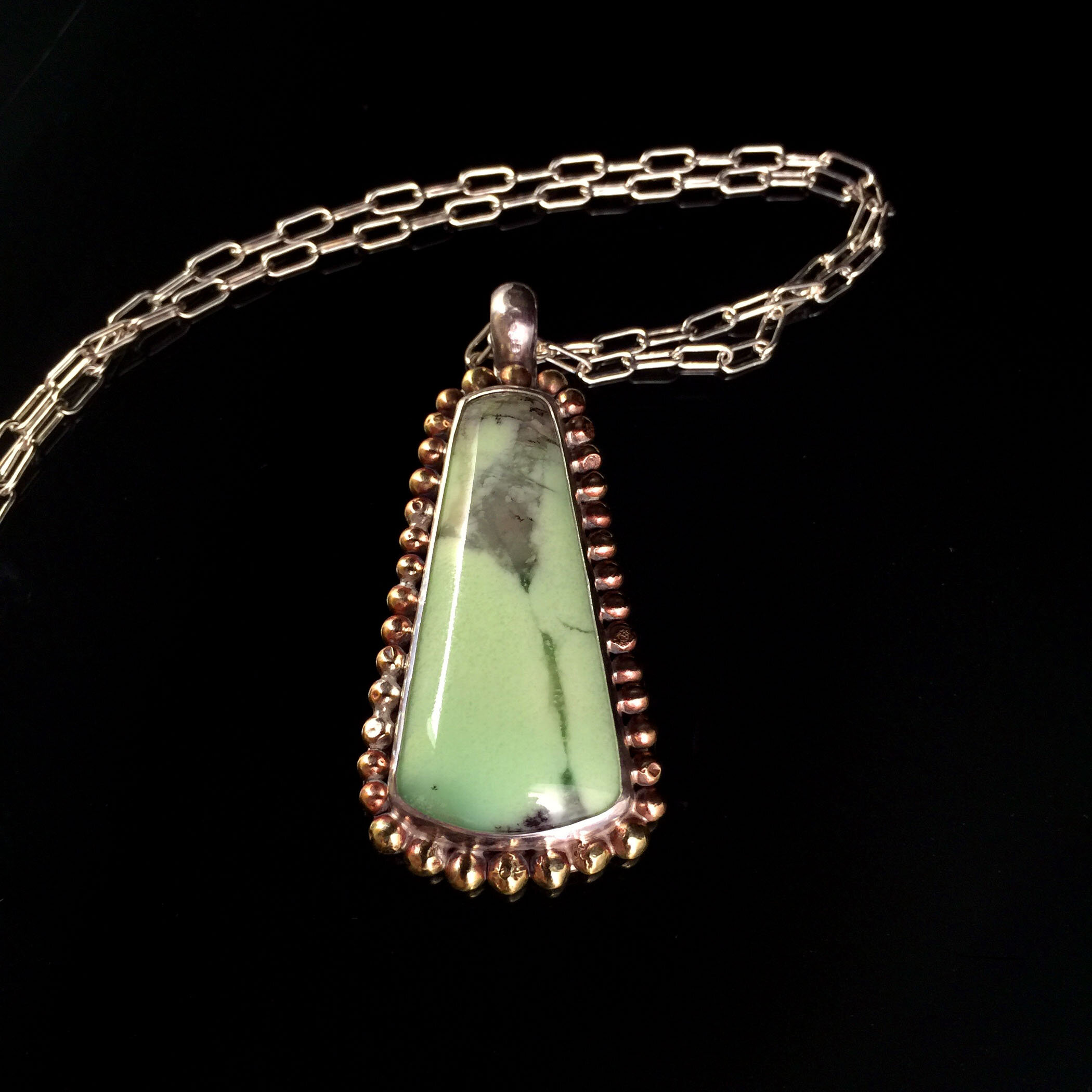 Citron chrysoprase bezel set with sterling silver and brass granulation.jpg