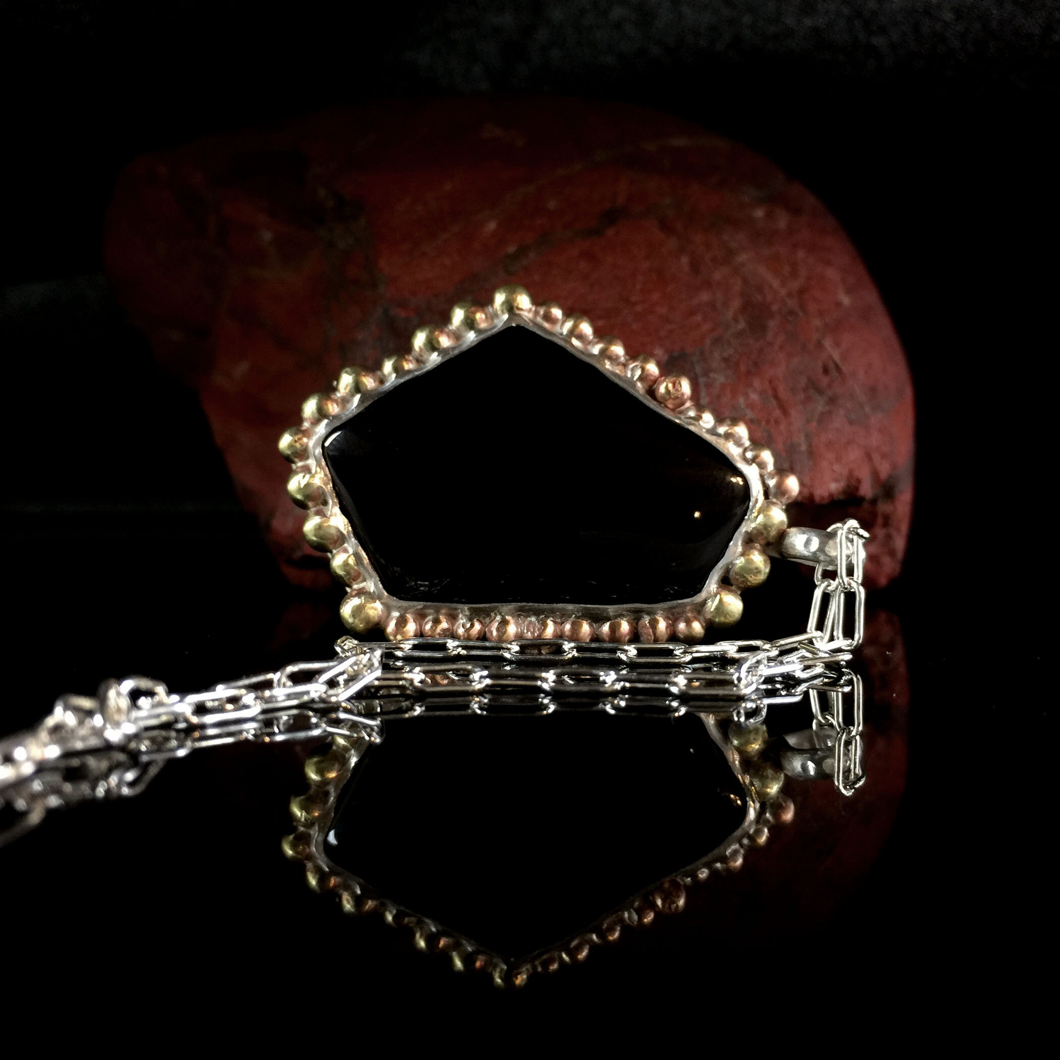 black onyx neckalce with sterling silver and brass granulation.jpg