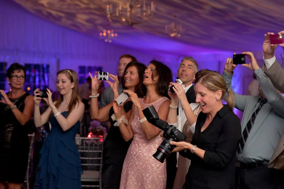 Andrea (member of the infamous A-Team) surrounded by well-meaning "second shooters) 