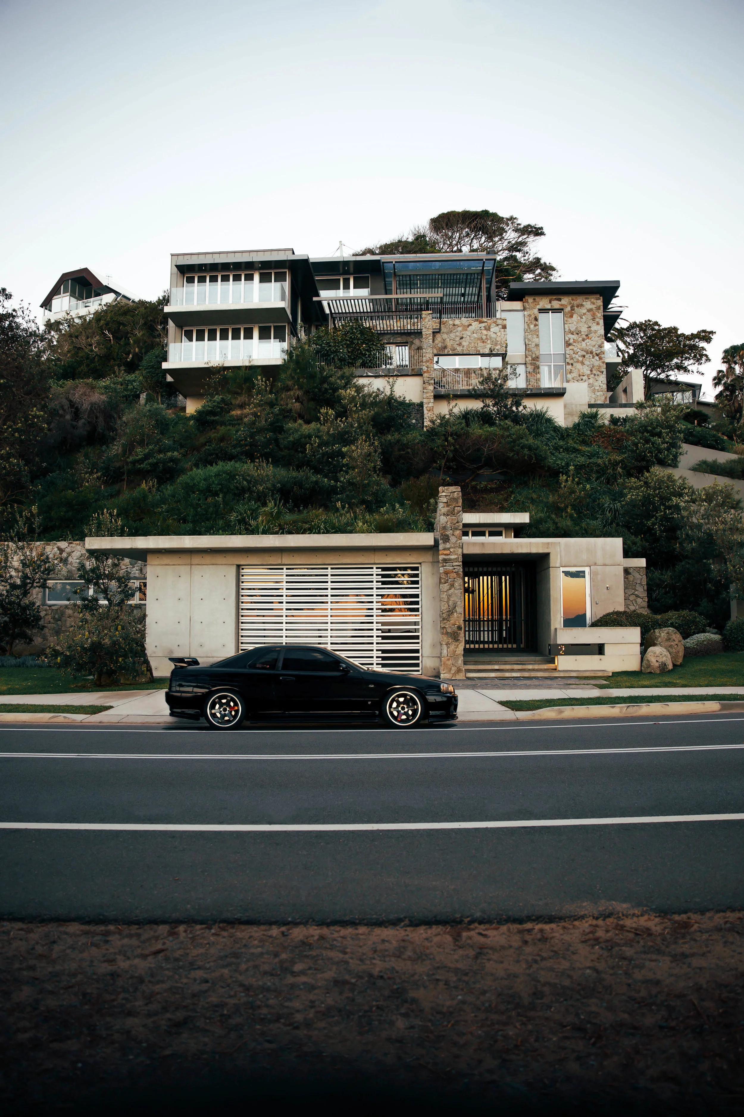 My two favourite things. Cars and Architecture. This was taken at 6AM outside my favourite house at Palm Beach, after I wrapped up my first ever Stay Driven video .