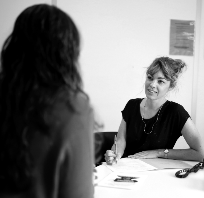 Capturing the stories of workplace discrimination is the first step. Here, a WEstjustice volunteer listens intently to a client’s experiences. Photo credit Jess Hogg (supplied).
