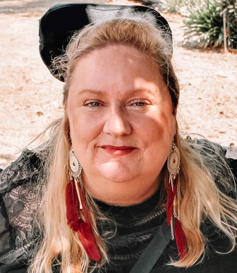 Photo of Dr Raelene West outside with sunlight on her face