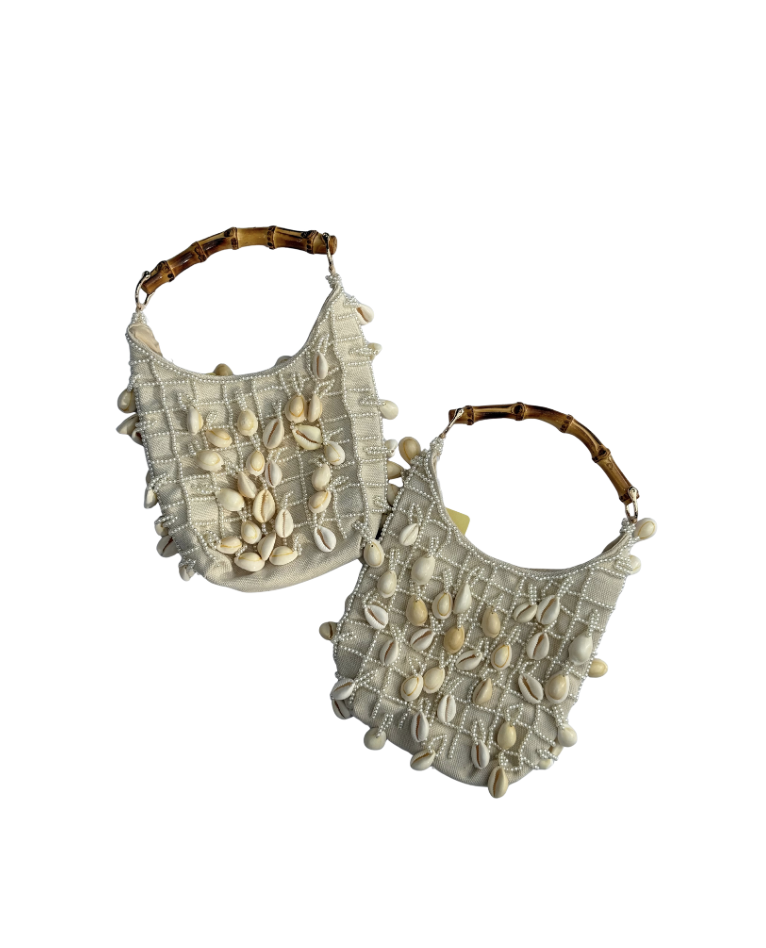 https://www.elodies.au/buy-gifts-elodies-camden-sydney/p/cowrie-pearl-embellished-bag