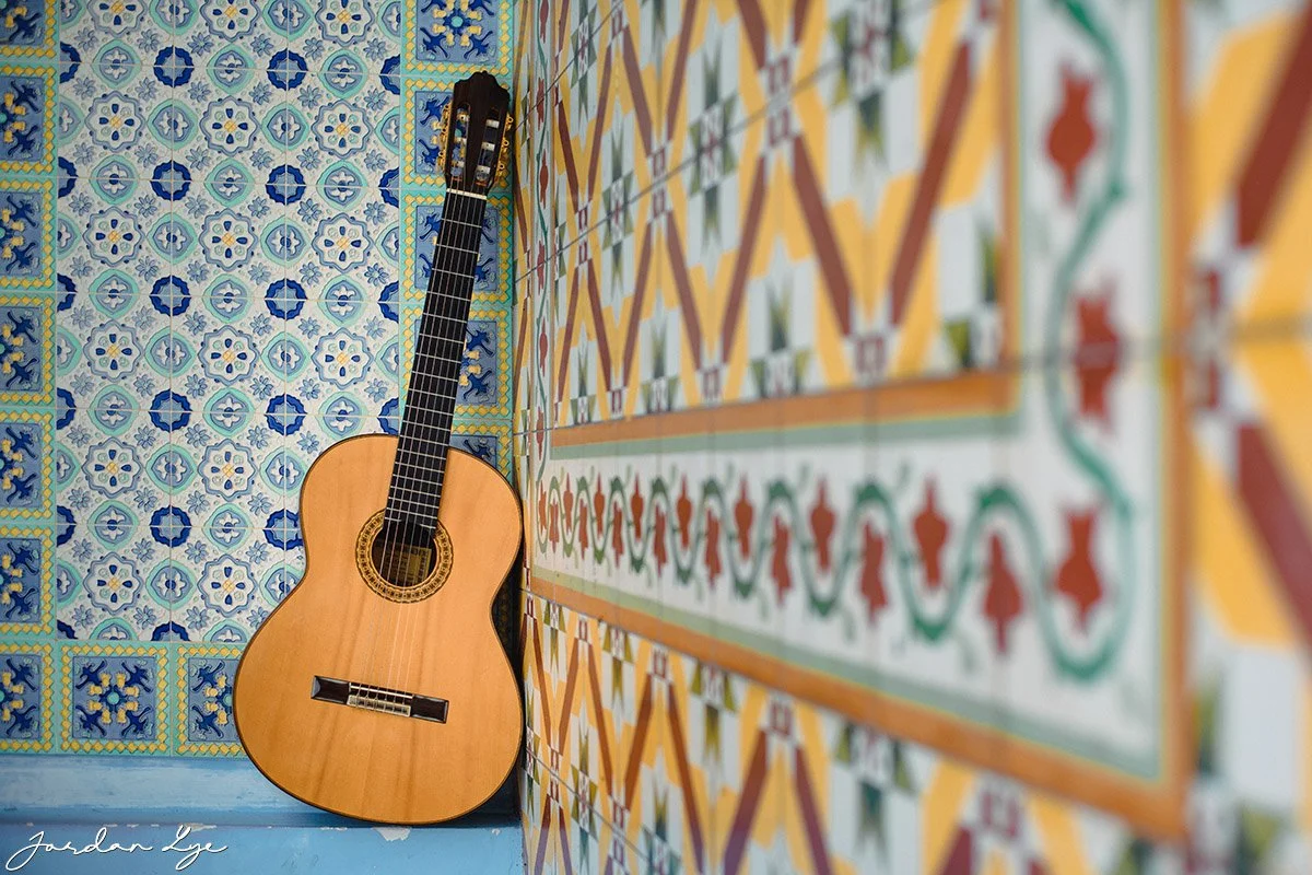 Classical guitar on vintage tiles