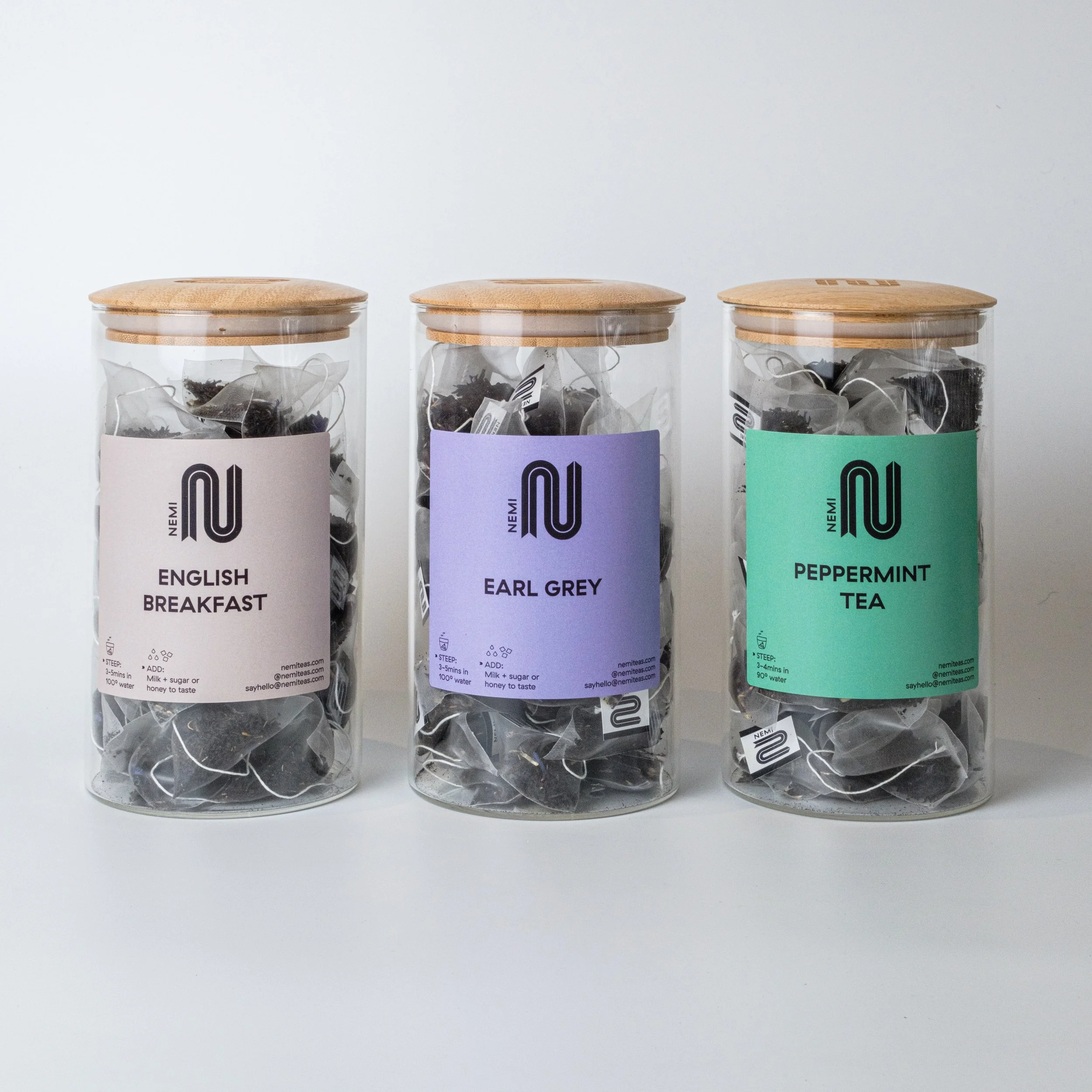 3 glass jars of NEMI Tea
