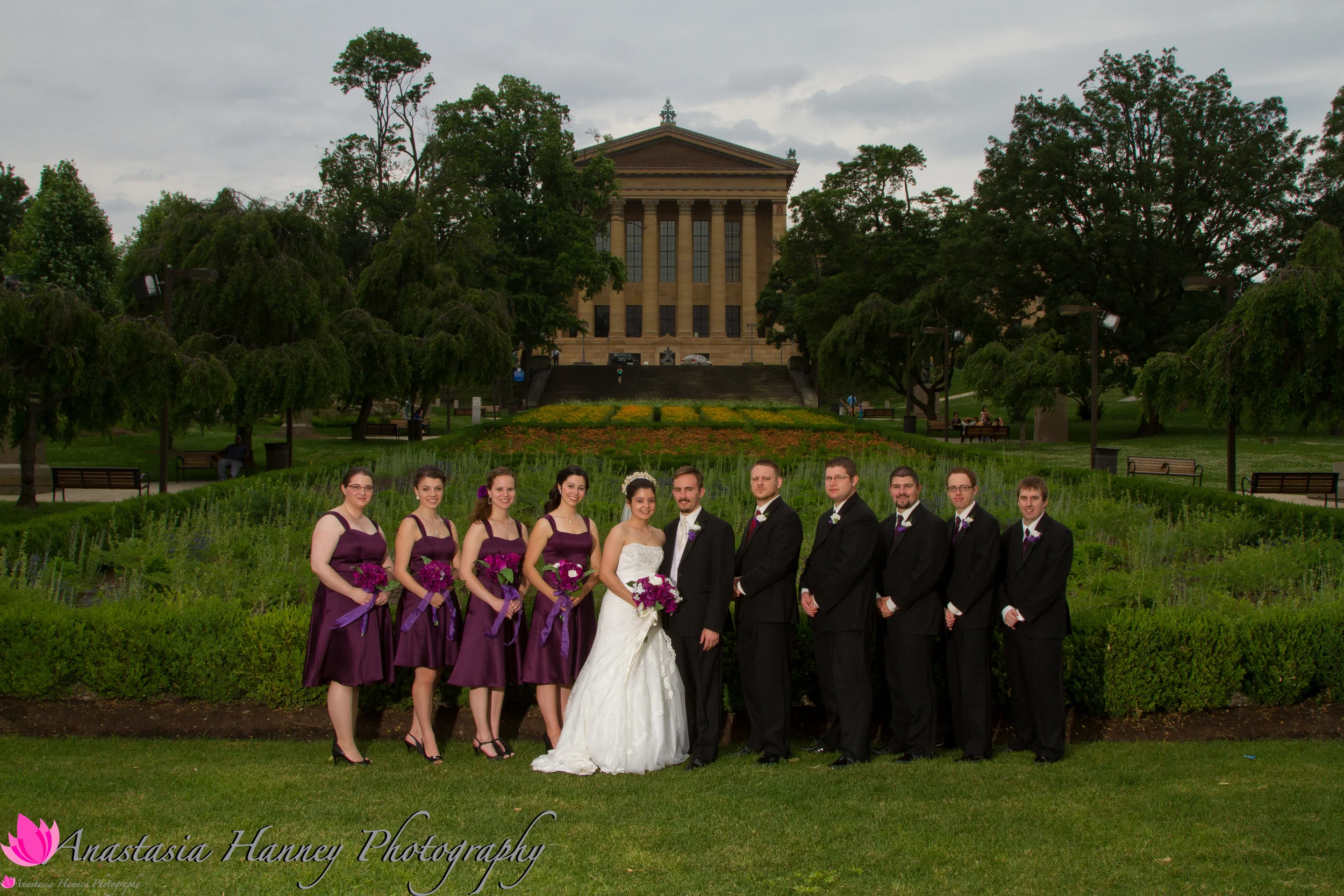 Bride and Groom with Happy Bridesmaids after Wedding at Saint St Nicholas Eastern Orthodox Church Russian Ukrainian in front of Philadelphia Museum of Art Pennsylvania Anastasia Hanney Photography