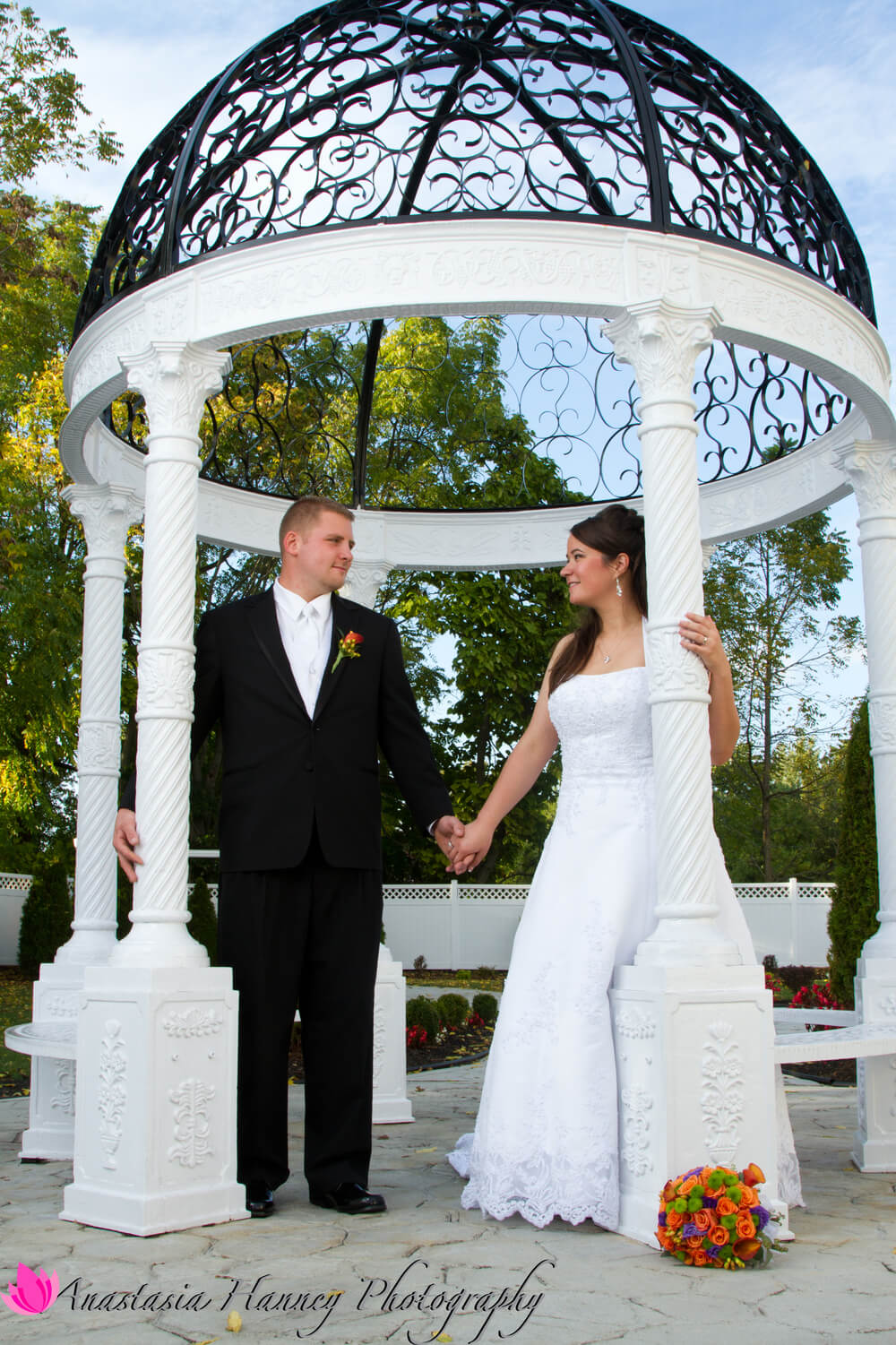 Wedding Photography of Bride and Groom Holding Hands in Gazebo at The Palace in Blackwood New Jersey by Anastasia Hanney Photography AHanneyPhoto