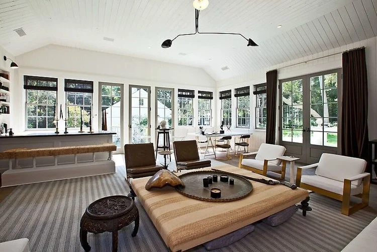 This living space is arranged to engage all activities in one space. And how can anyone ignore the abundance of natural light and views of the lavish gardens surrounding the estate? The outside effortlessly adds life and tranquility into the home.