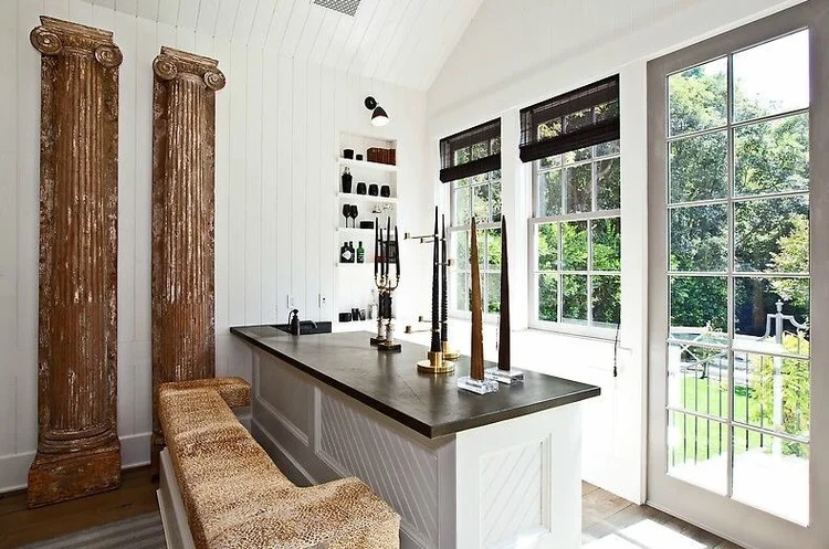 Antique table base by Obsolete and Caesarstone top.