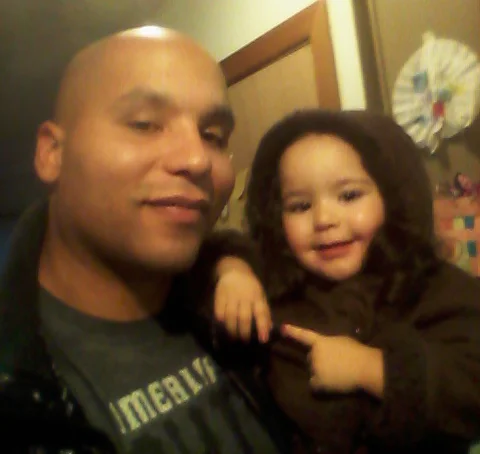 After struggles, father shows others path toward success