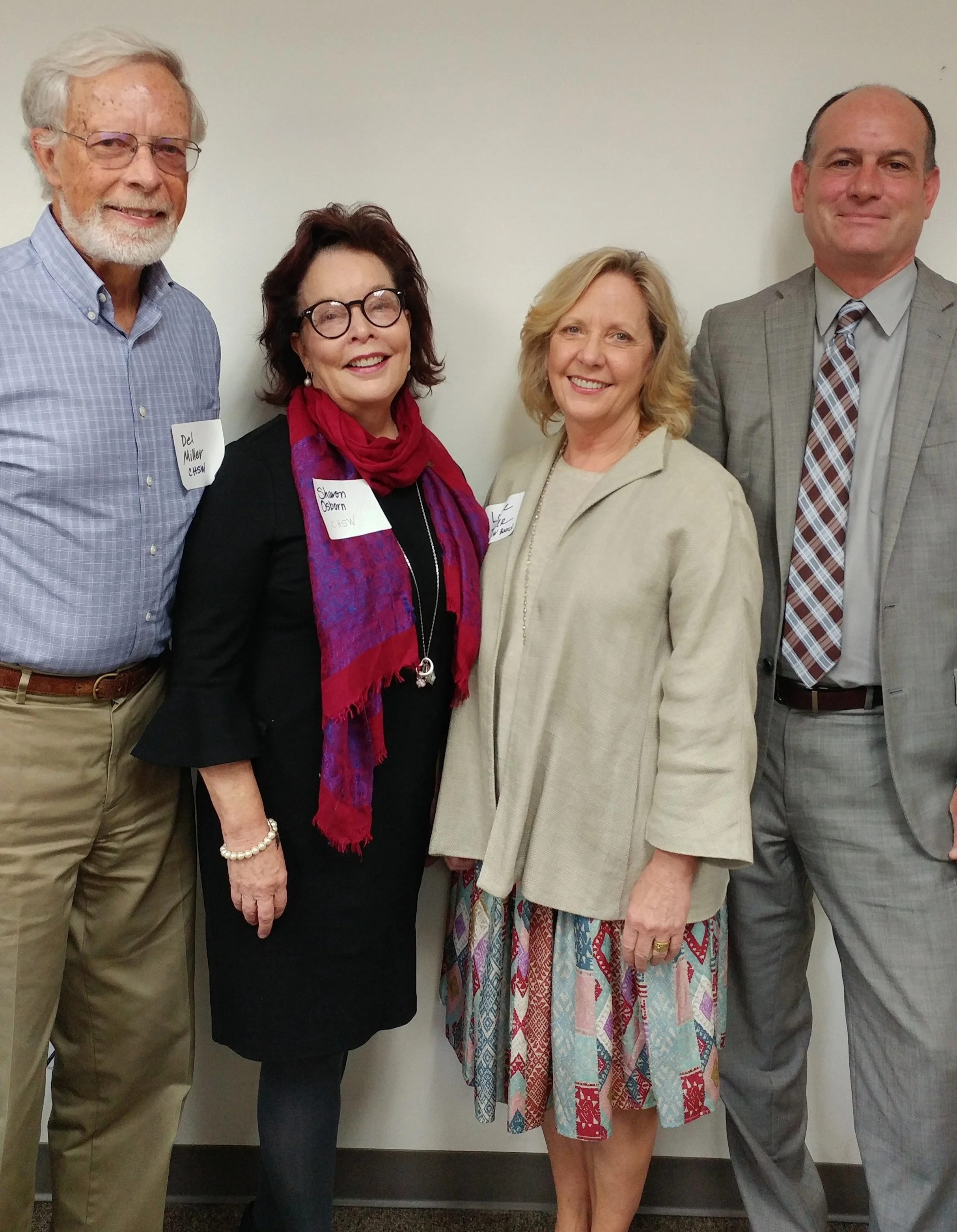 Photo from left to right: Del Miller, CHSW board; Sharon Osborne, CHSW president/CEO; Louise Parker, CHSW board; Frank Ordway, director of Government and Community Affairs for the new Department for Children, Youth and Families.