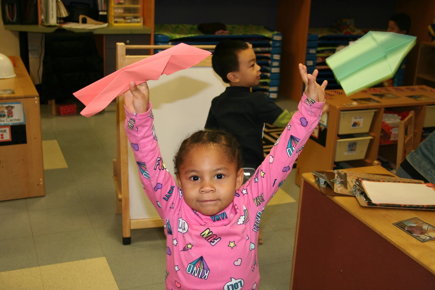 Preschooler Danielle had a fun time seeing if her planes would fly.