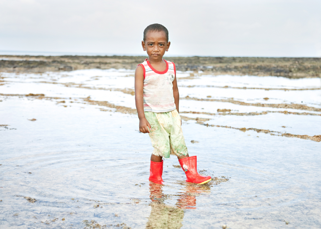 Boy with Red Boots