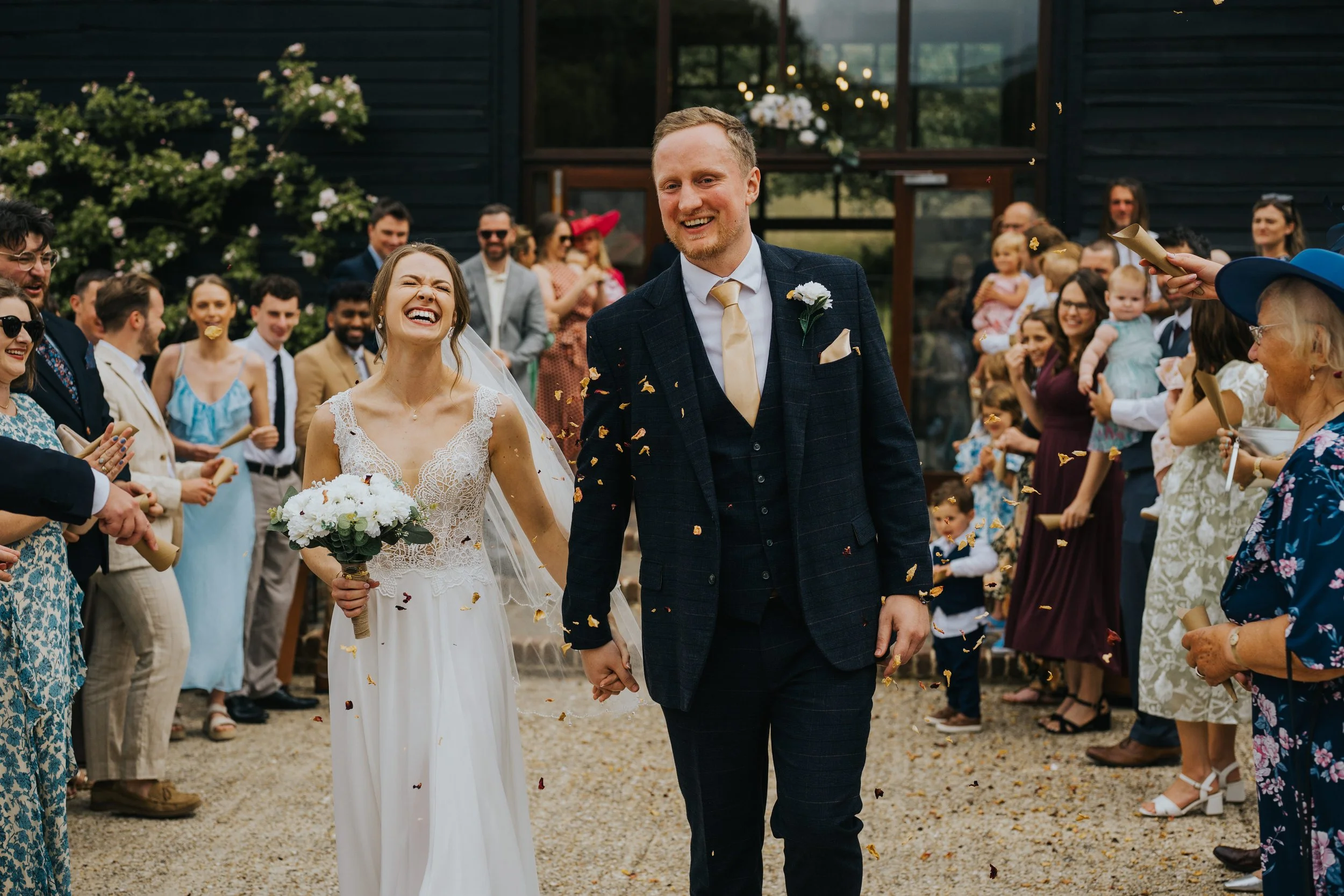 Confetti shot of couple at Upwaltham barns