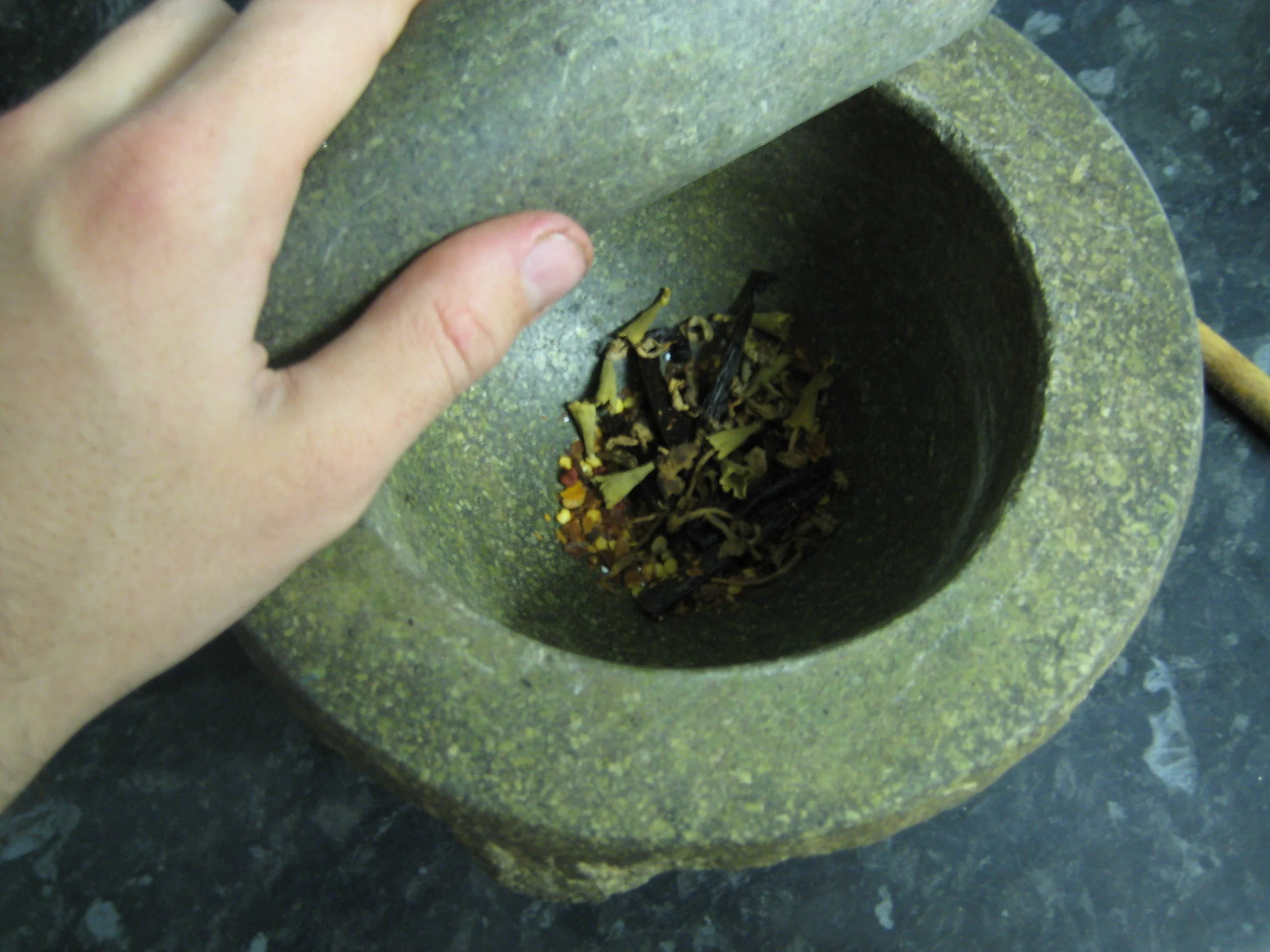  Grinding chocolate spices, London, U.K., 2011 