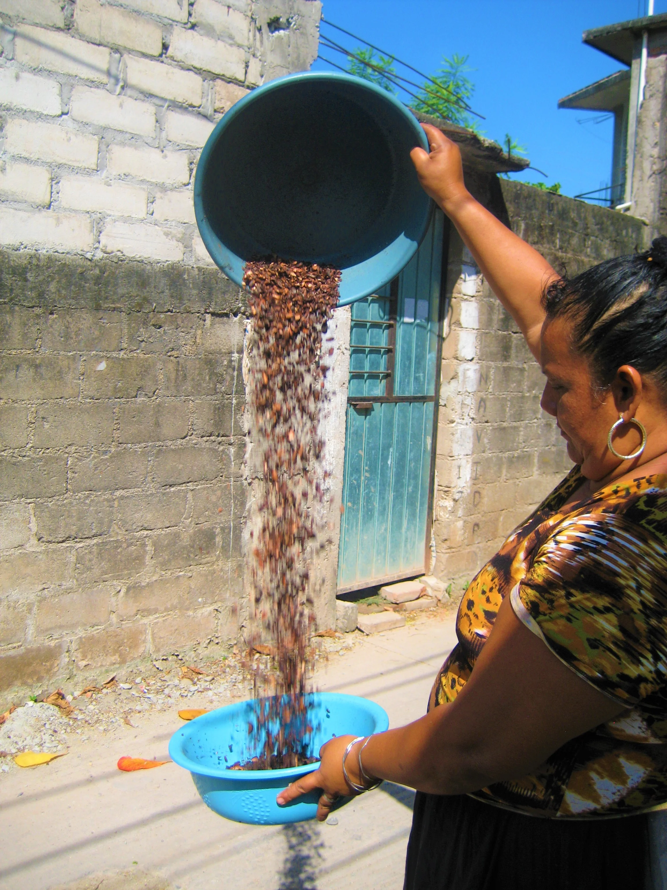  Señora Vásquez winnows toasted Cacao, Juchitan, Mexico, 2018 