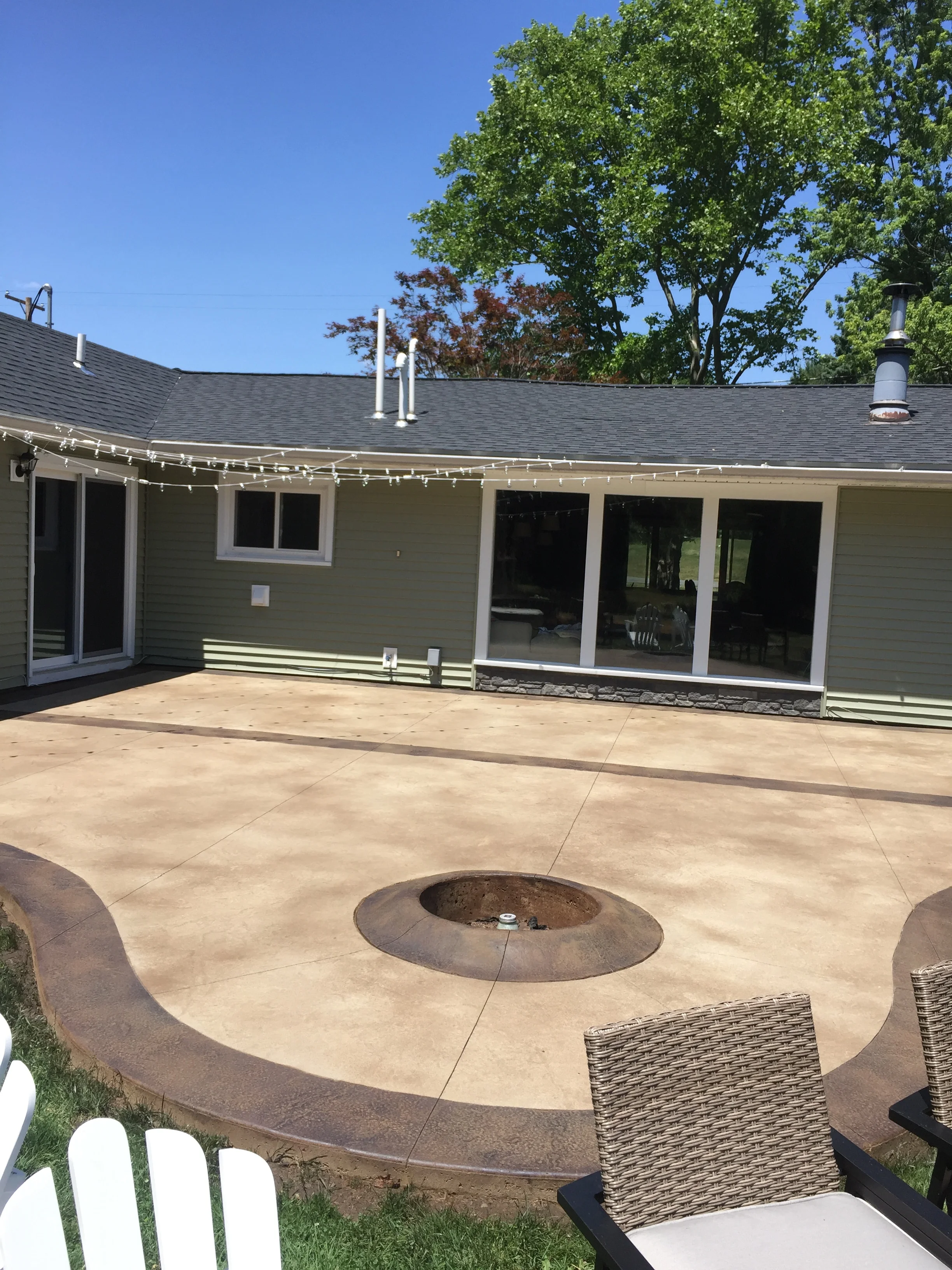 stamped concrete patio with fire pit on B W Concrete Inc