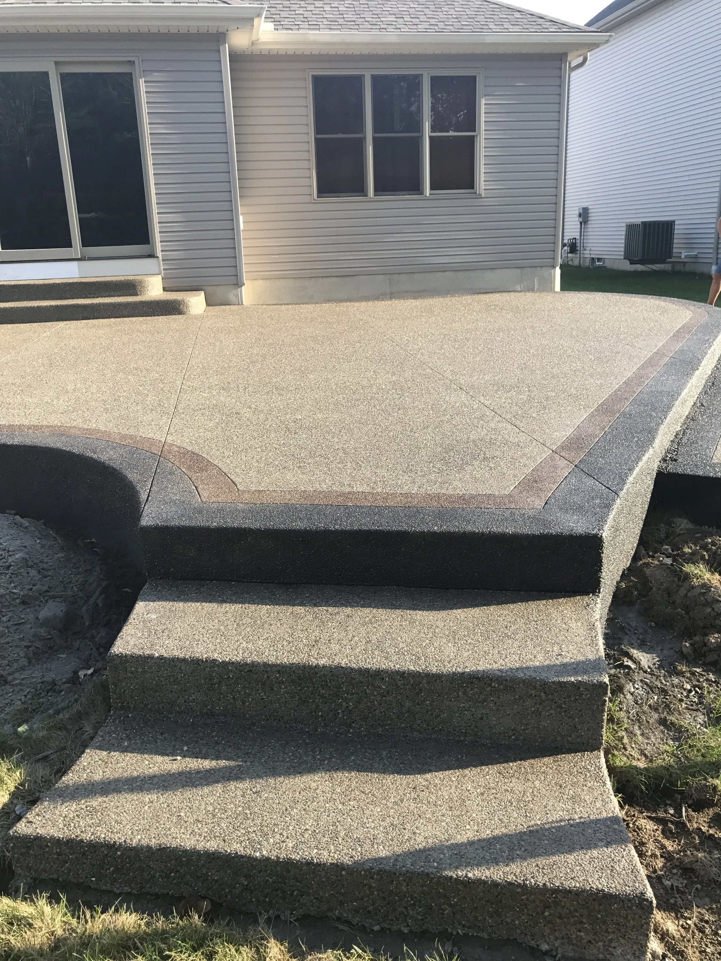 B&amp;W Custom Concrete Steps for your patio. Tri-colored, decorative patio steps.