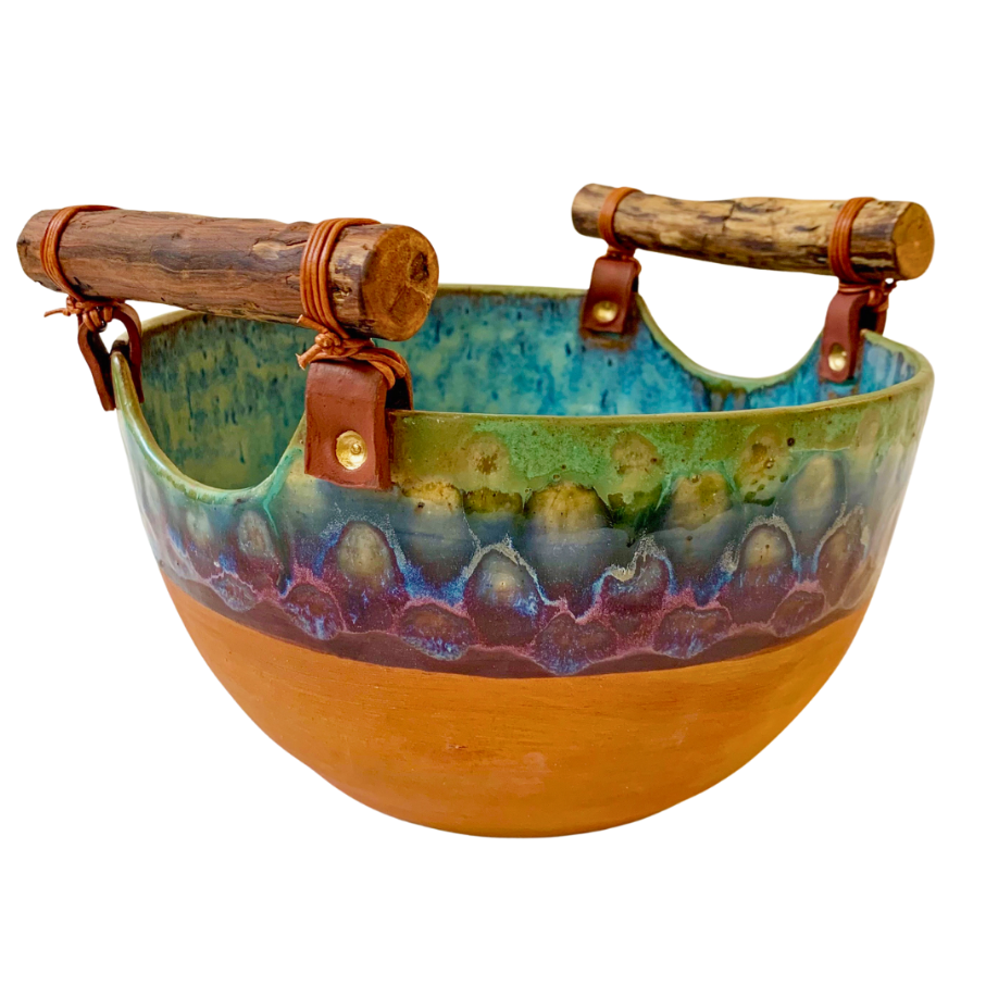 Offering Bowl
Susan Volk (2025)
Coil build, leather hand sanded wood, ceramic and enamel casters with leather binding
