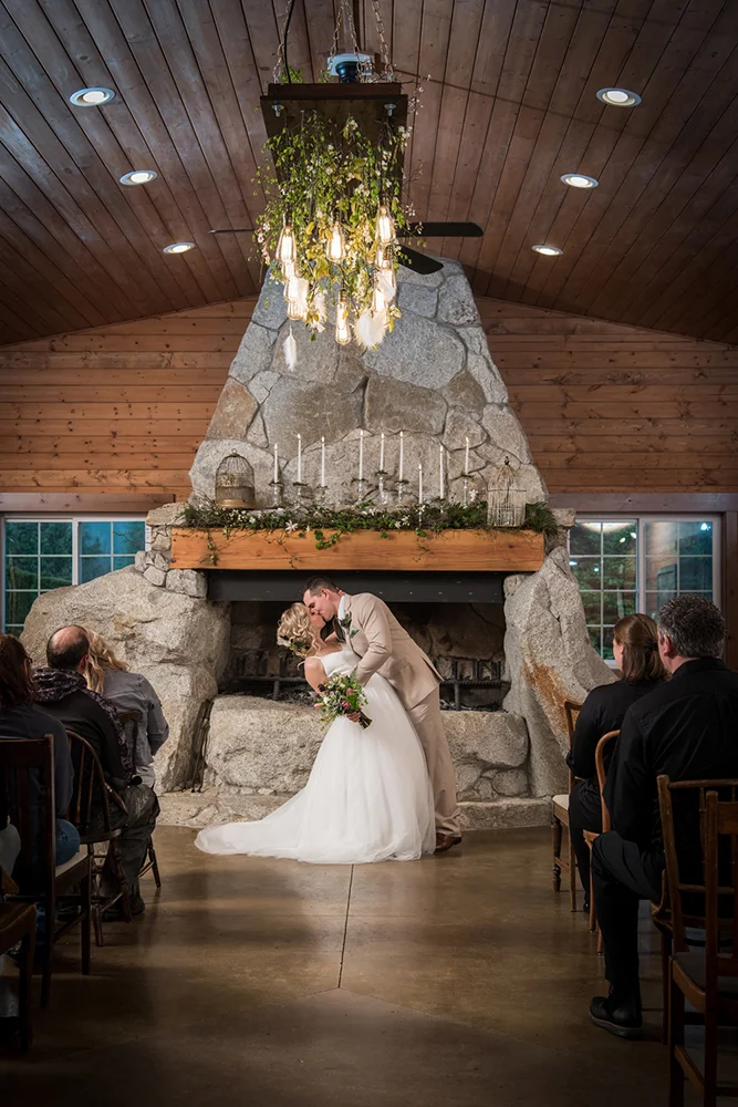 styled_shoot_wedding_kiss_fireplace_ceremony_IJPhoto_Pine_Creek_Nursery_0184.jpg