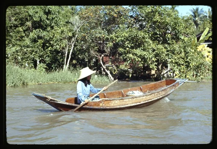 0403 Woman Paddling in Small Boat.jpg
