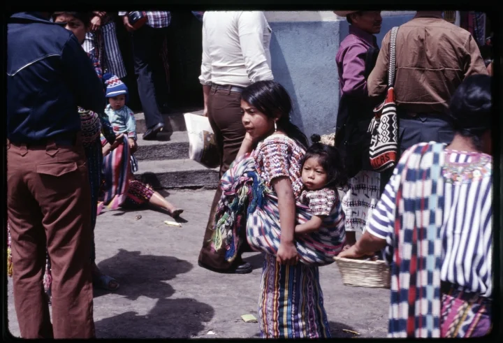 0722 Woman Carrying Baby on Back.jpg