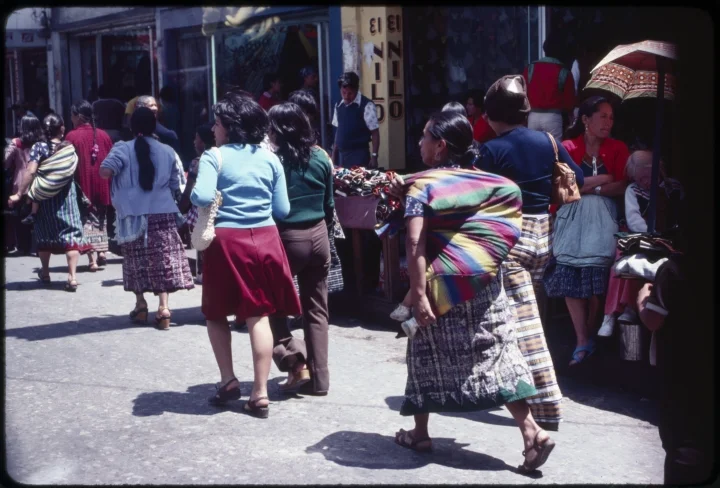 1360 Woman Carrying Child in Back Blanket.jpg
