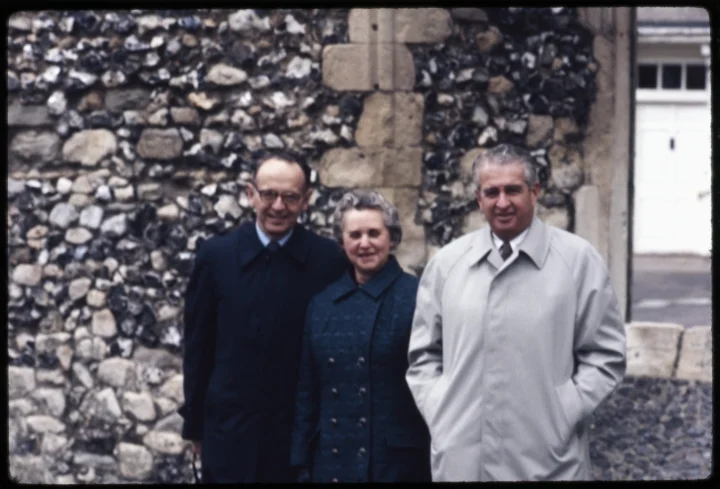 1299 Three People in Front of Building.jpg