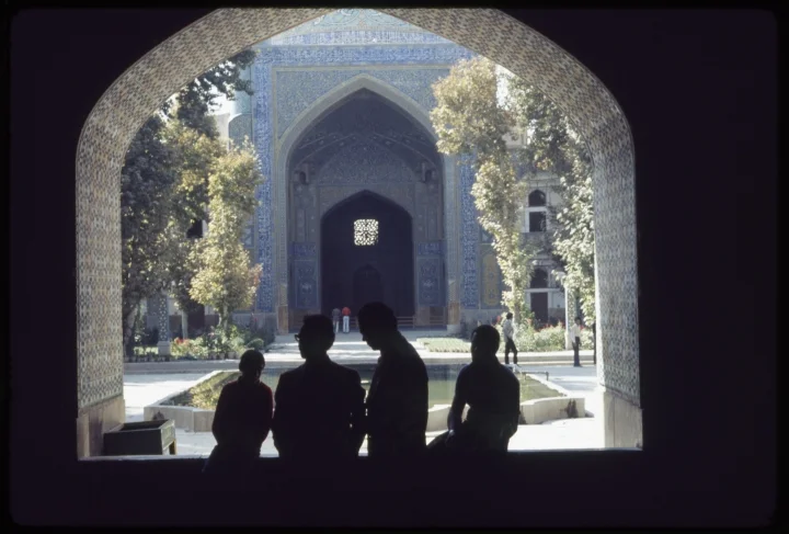 1498 Four People in Decorative Archway-Shadow.jpg