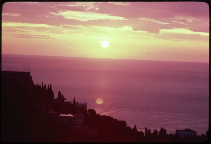 1554 Sunset Over Ocean-House on Hill.jpg