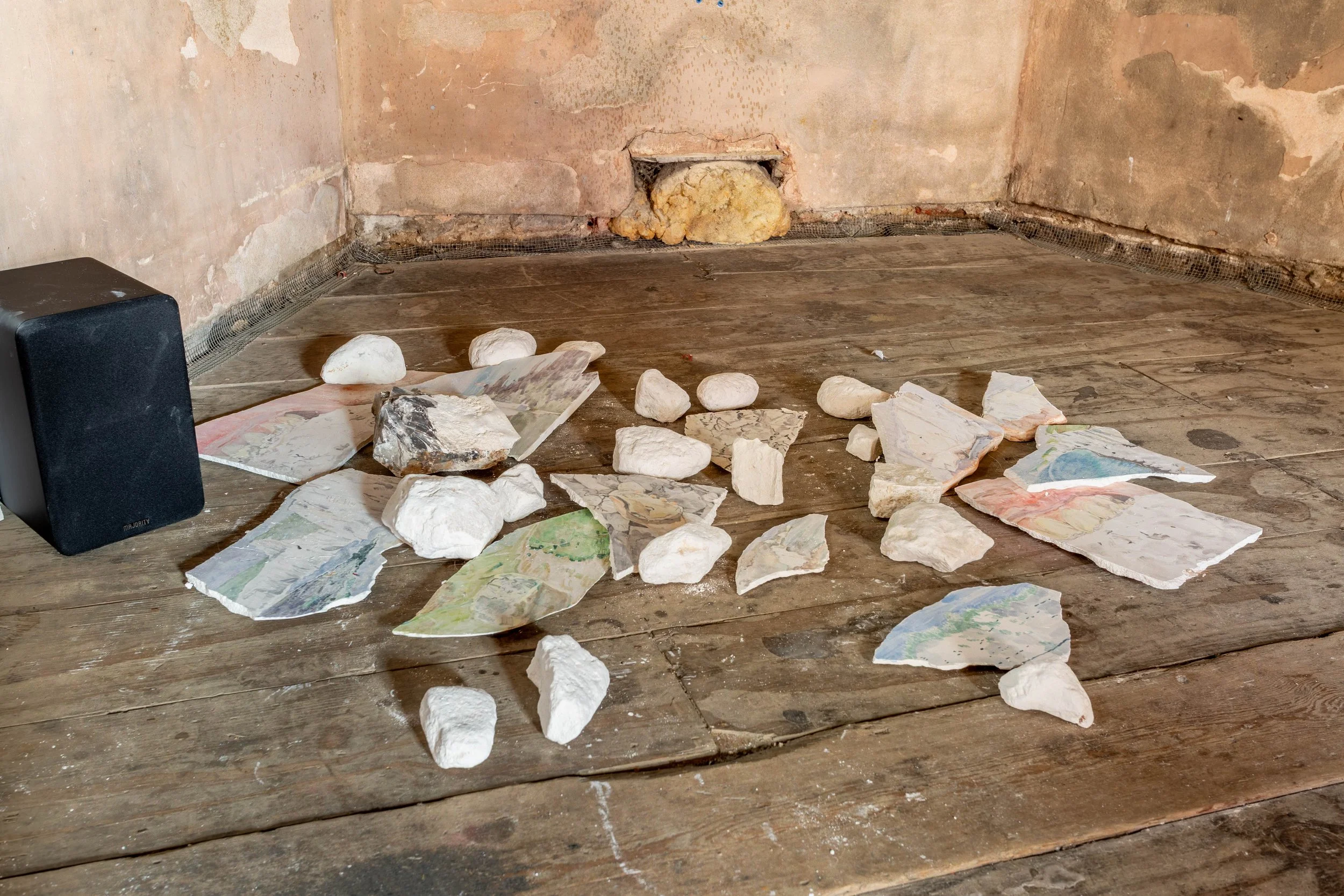   Chalk  video projection, mirror and shelf, cheese, chalk and paintings on plaster 