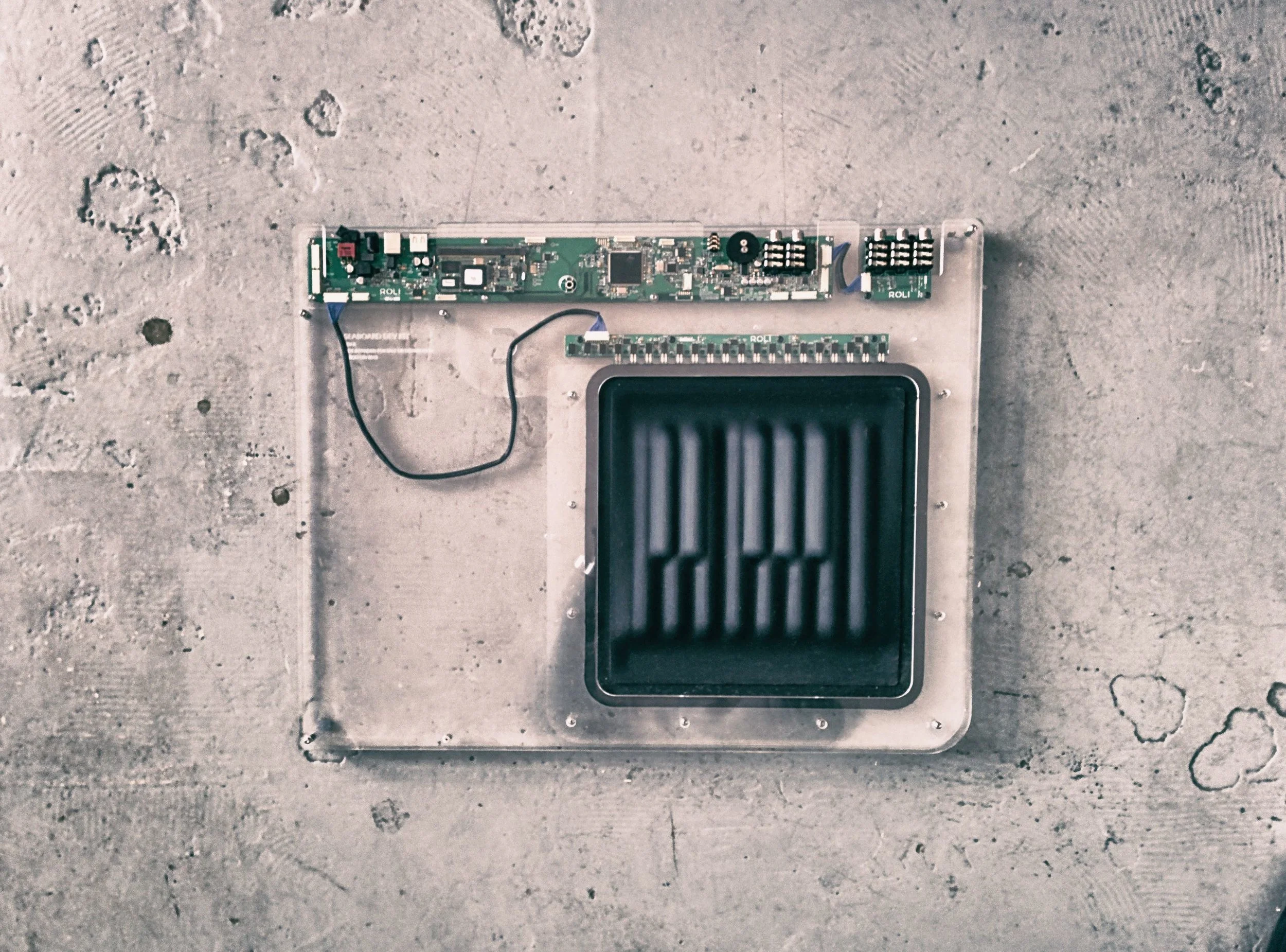   The prototype shown above represents the first integrated, single octave unit of ROLI’s novel pressure sensitive technology. In addition to the overall mechanical engineering of the product and components,  I was responsible for creation of several