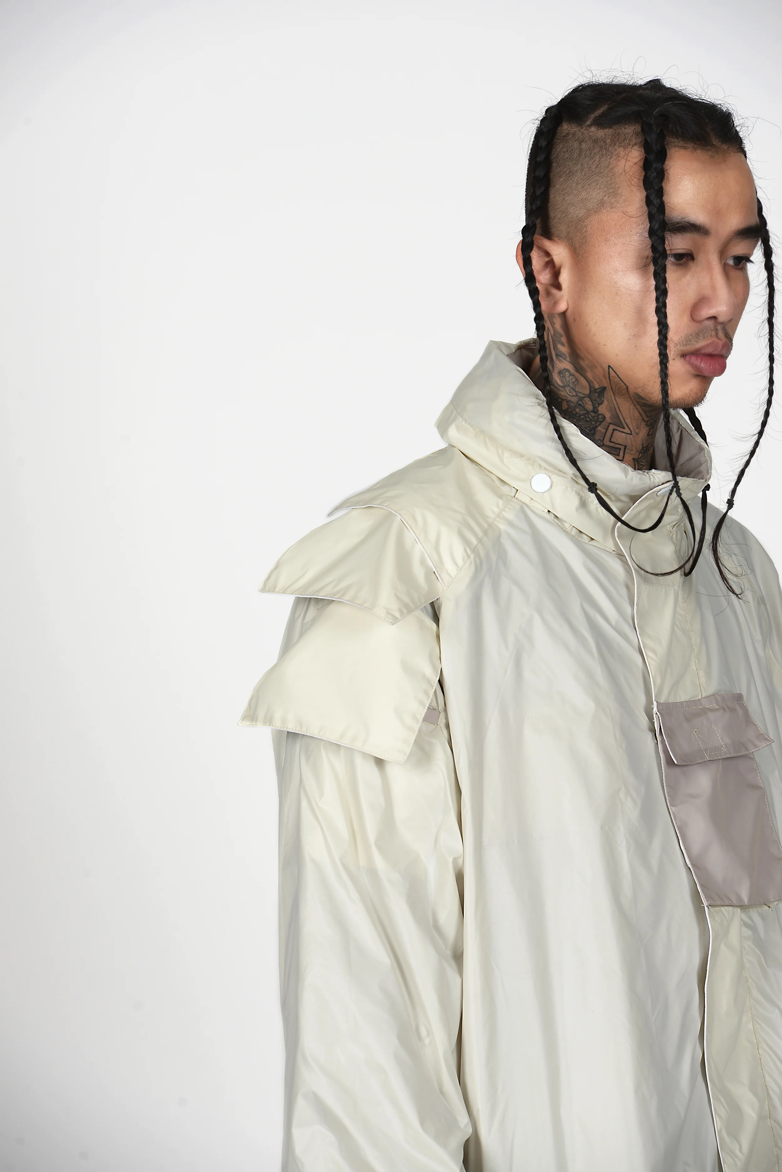 03 Heightened Sense white rain coat.jpg