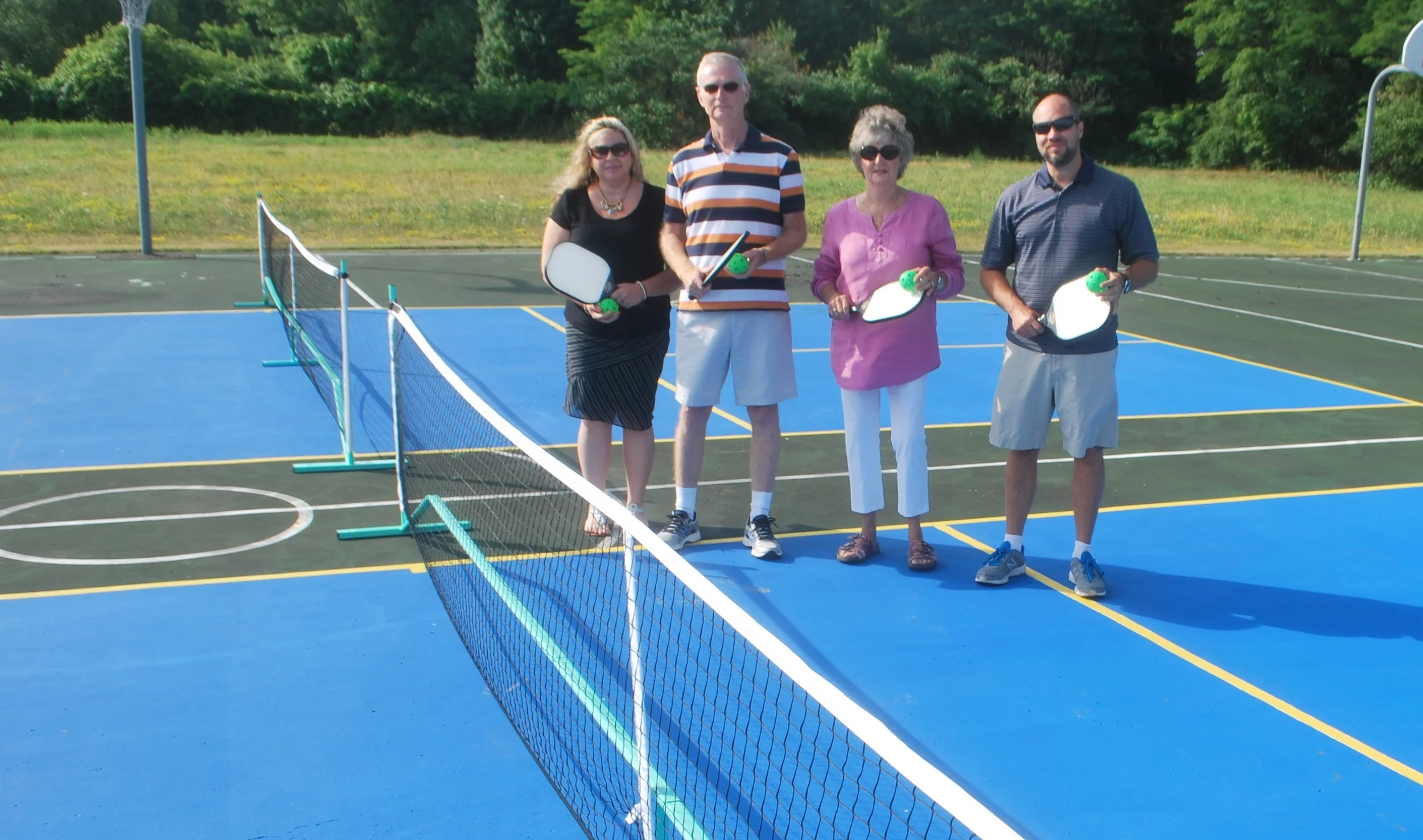 Pictured from left: Eileen Dunn, NCCF Program Coordinator, Bill Culligan, Northlake President, Helen Baran, NCCF Board Member and Matt Eggleston, Northlake Family Rec. Center.