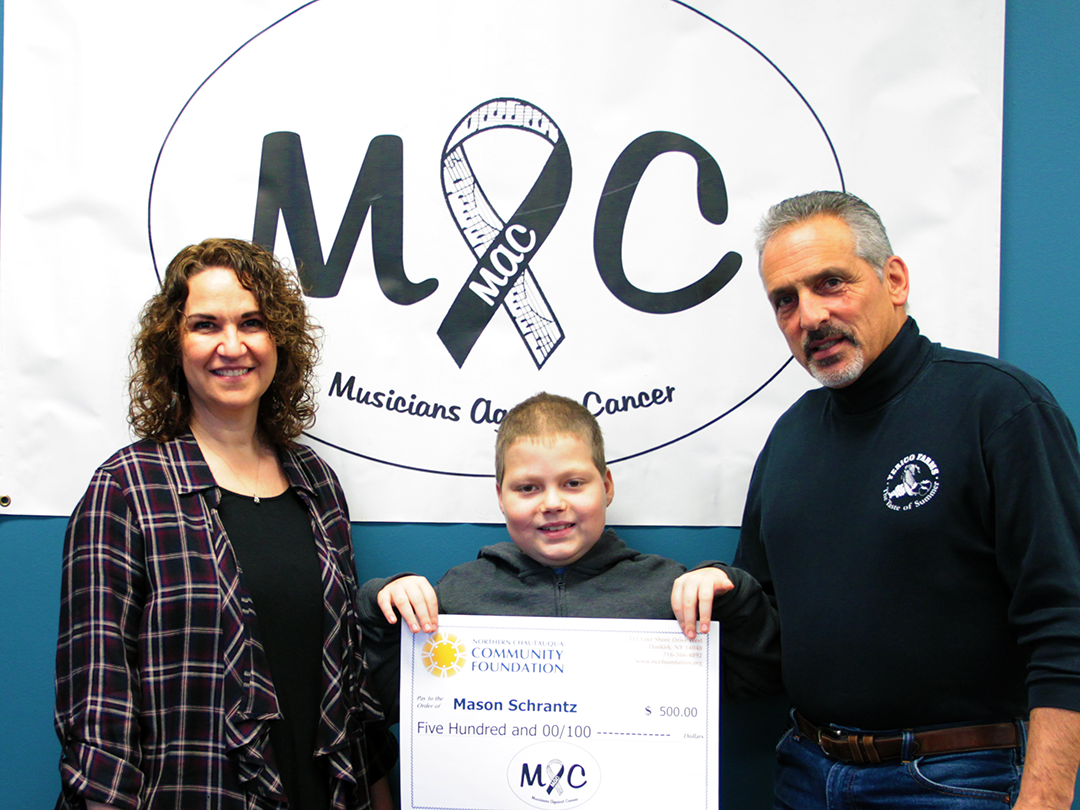 “We are overjoyed to present Mason Schrantz a check from our bands fund this Christmas! Mason is an amazing boy! We would like to thank all our donors and supporters! This is why our band and the fund was created. Thank you from all of us; John, Kristin, Nancy, Marty & Sandy!”