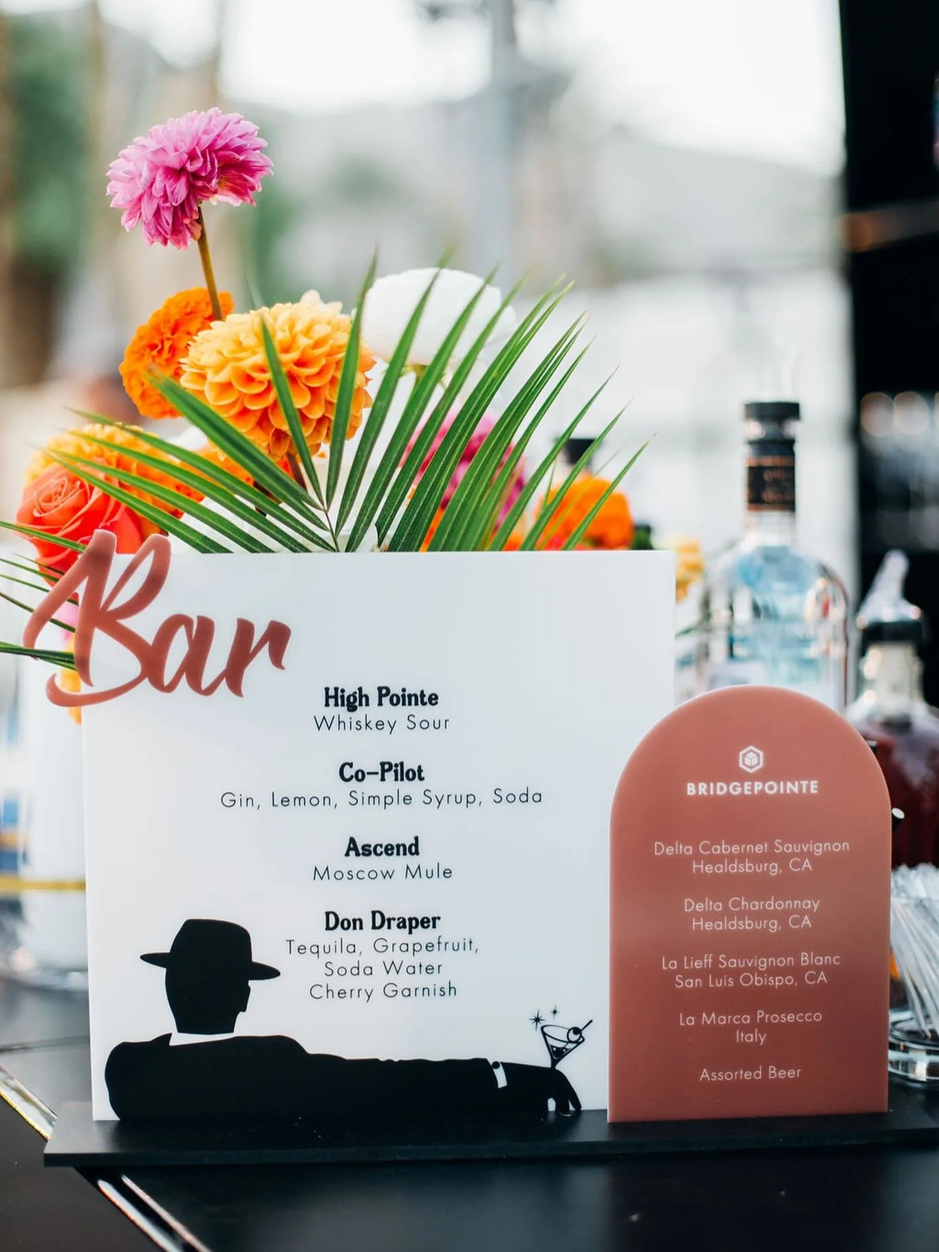 Channeling our inner Draper with a signature bar that means business. 🥃💼 The only thing smoother than the scotch is this bar setup! 
&bull;
&bull;
&bull;
&bull;
&bull;
&bull;
#Signaturebarinspo #Signaturedrinkinspo #Dondraper #Madmen #Corporatevent