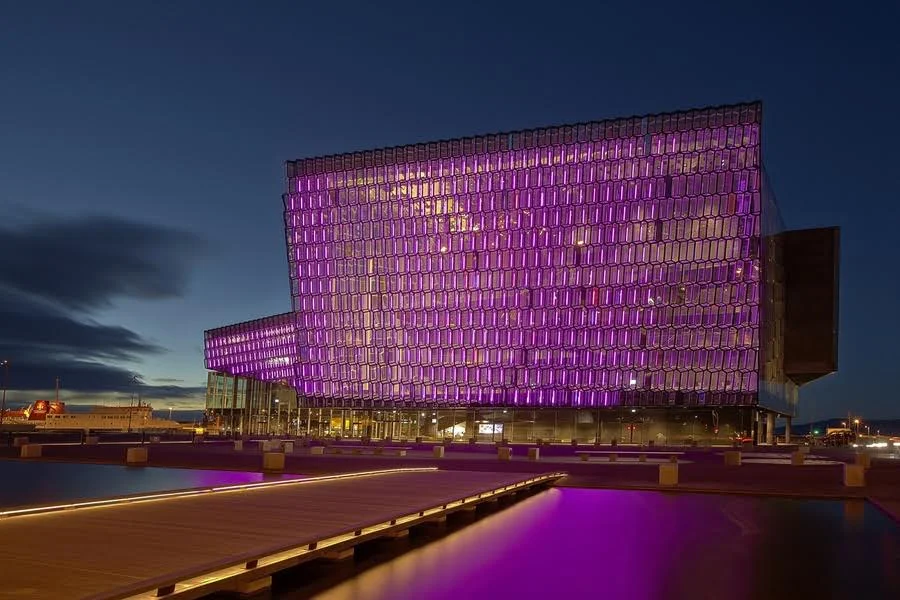 The show is in English, performed at the Harpa concert hall.
