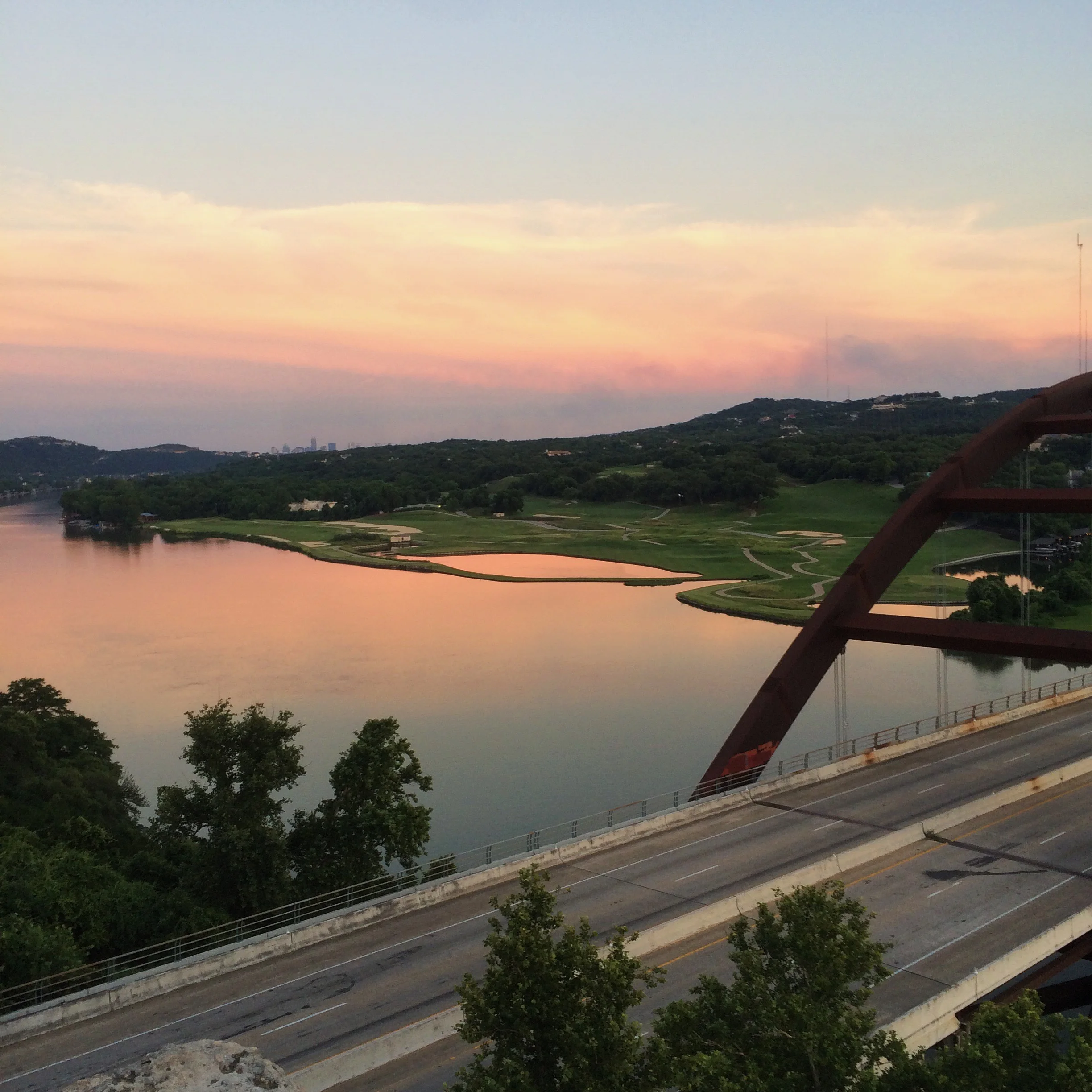 The sunsets are beyond gorgeous this summer. I took this picture a few weeks ago. Last night's sunset had the most bold colors of orange and pink and purple I've seen in a long time. Sadly I wasn't in a good location to snap a photo.